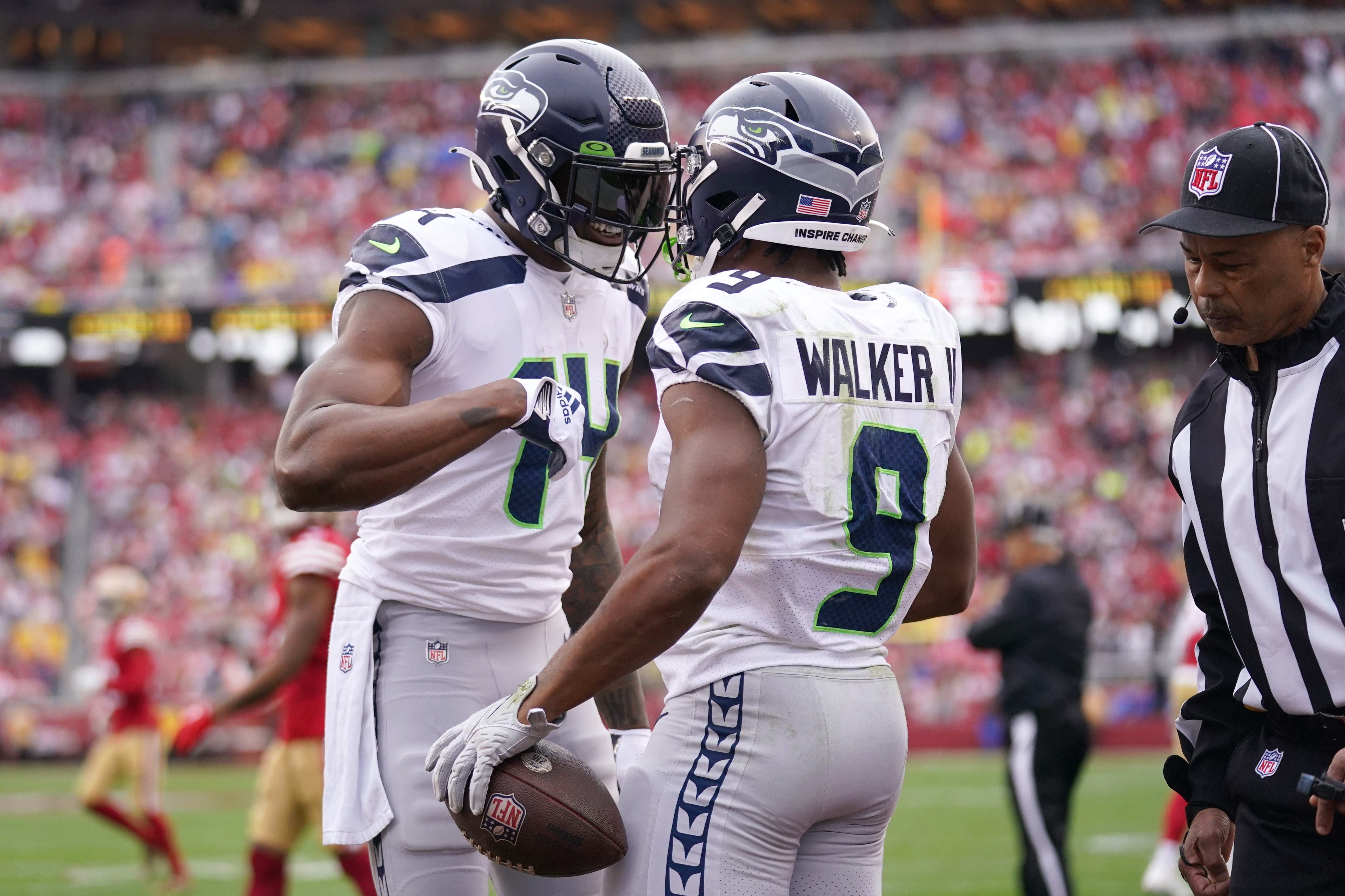 Jan 14, 2023; Santa Clara, California, USA; Seattle Seahawks wide receiver DK Metcalf (14) congratulates running back Kenneth Walker III (9) after his second quarter touchdown run during a wild card game against the San Francisco 49ers at Levi's Stadium.