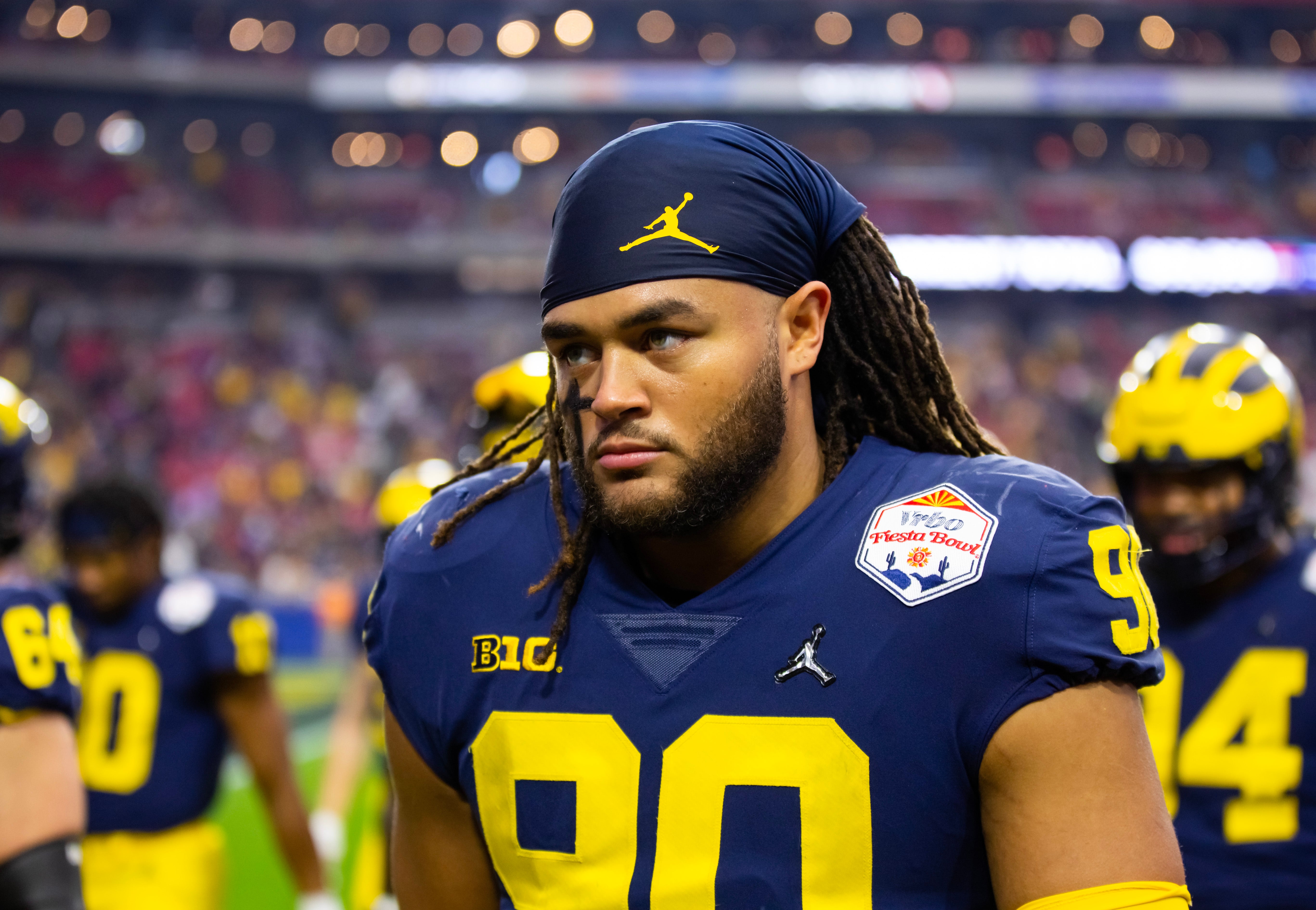 Dec 31, 2022; Glendale, Arizona, USA; Michigan Wolverines edge Mike Morris (90) against the TCU Horned Frogs during the 2022 Fiesta Bowl at State Farm Stadium.