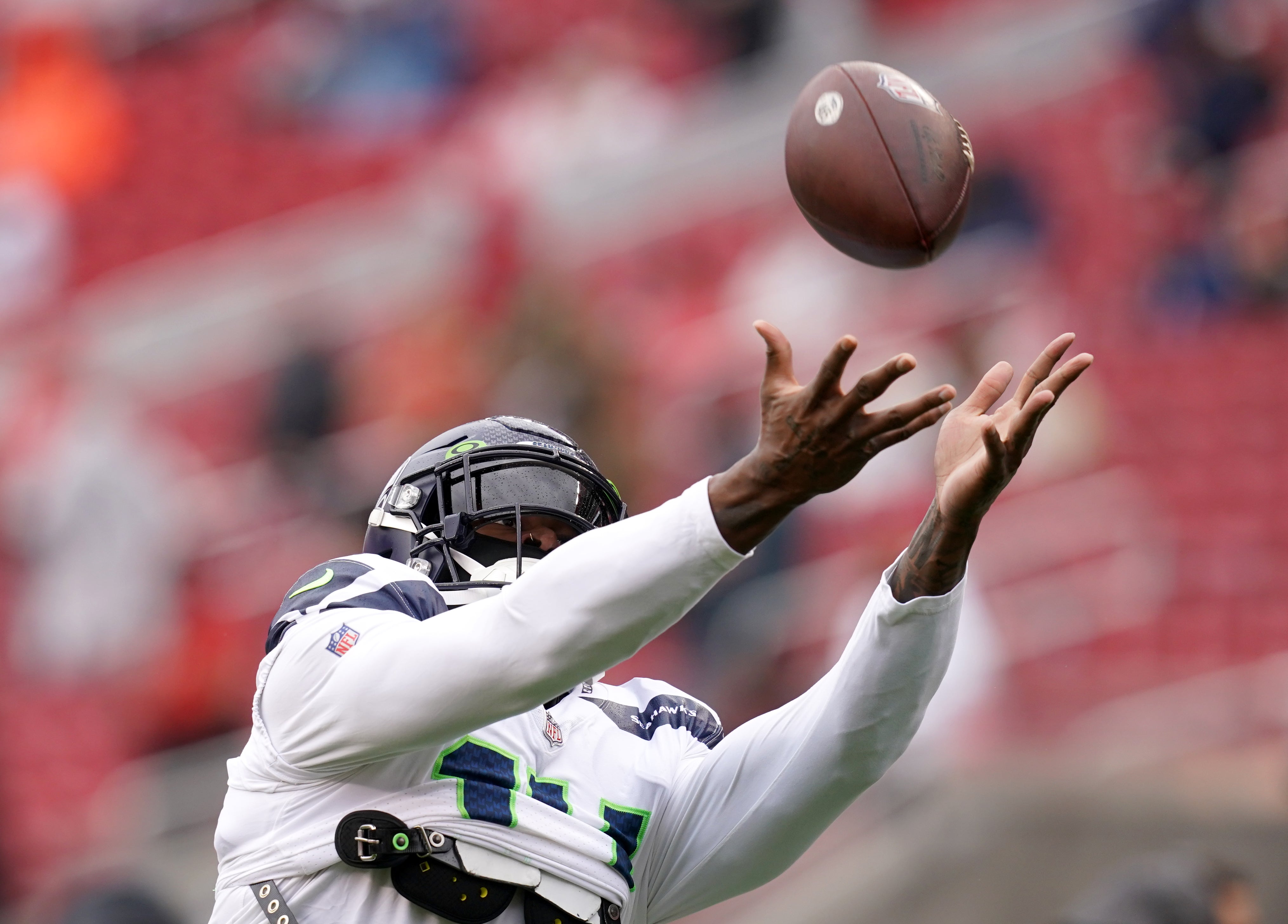 Jan 14, 2023; Santa Clara, California, USA; Seattle Seahawks wide receiver DK Metcalf (14) warms up before a wild card game against the San Francisco 49ers at Levi's Stadium.