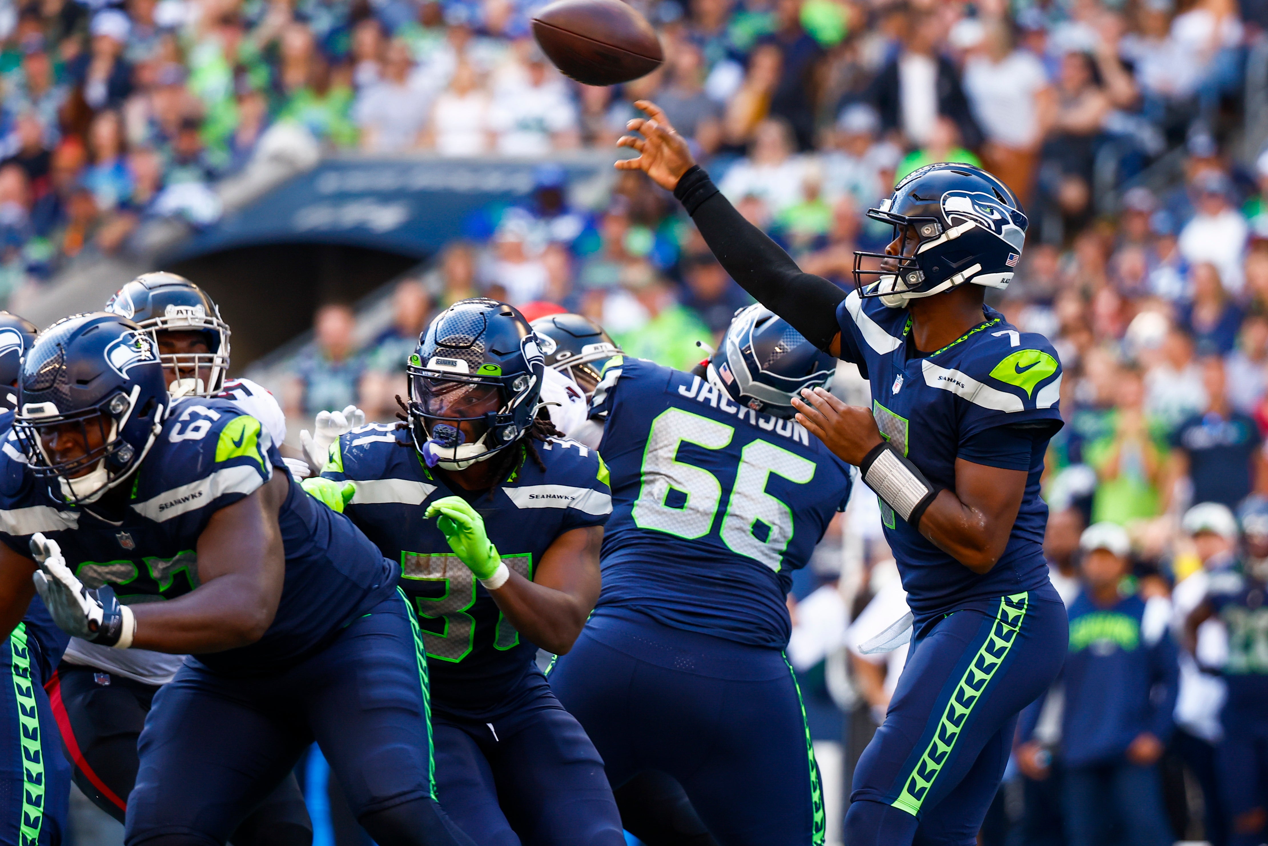 Sep 25, 2022; Seattle, Washington, USA; Seattle Seahawks quarterback Geno Smith (7) passes against the Atlanta Falcons during the fourth quarter at Lumen Field.