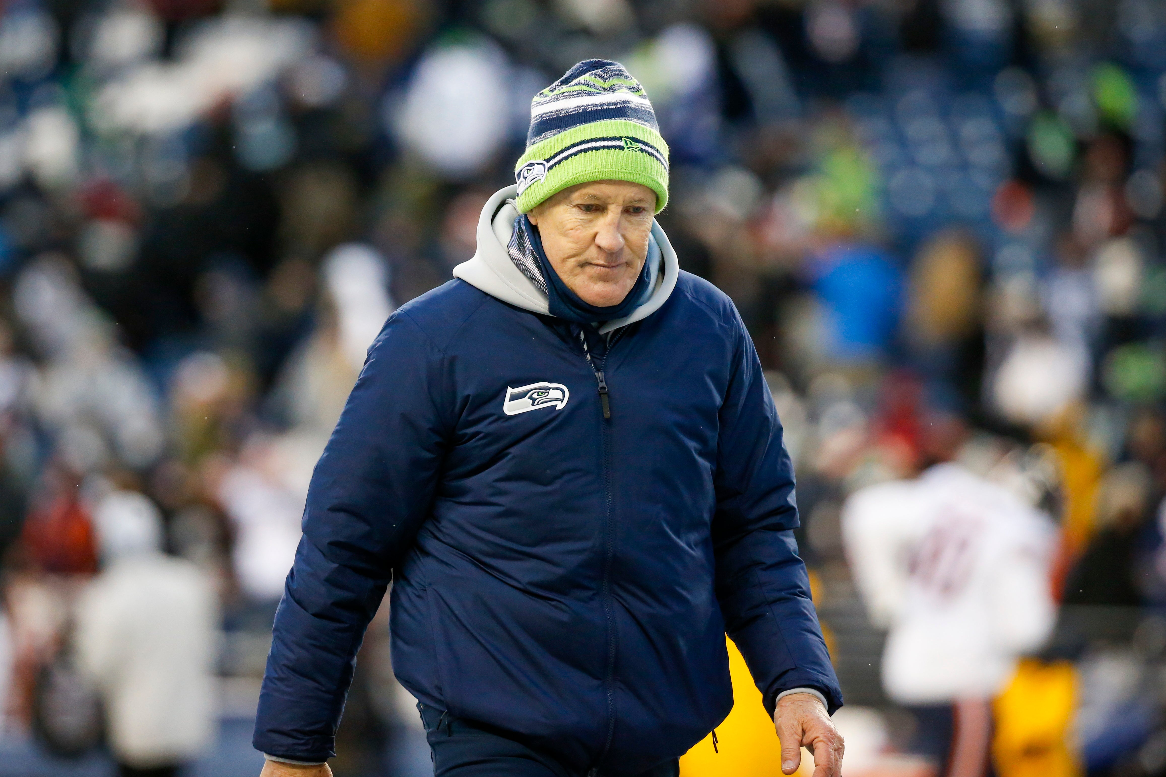 Dec 26, 2021; Seattle, Washington, USA; Seattle Seahawks head coach Pete Carroll walks to the locker room following a 25-24 loss against the Chicago Bears at Lumen Field.