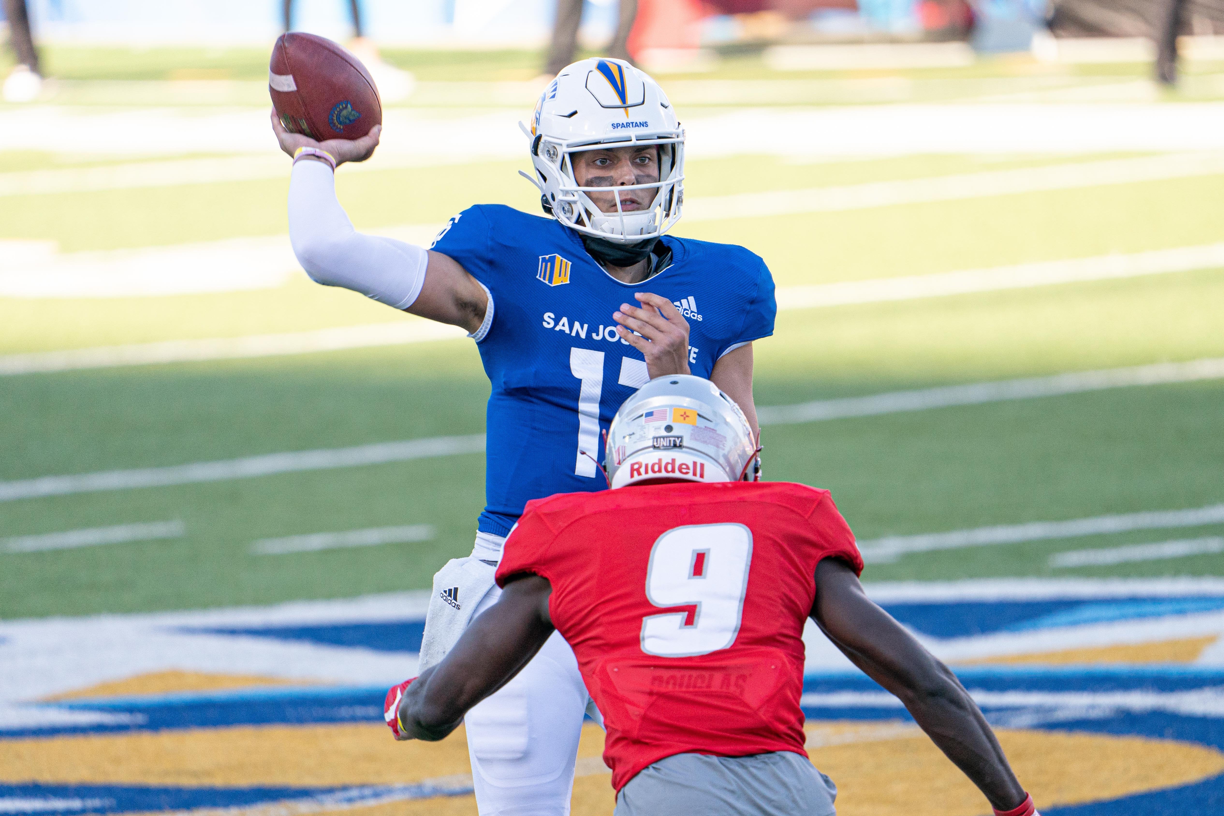 Oct 31, 2020; San Jose, California, USA; San Jose State Spartans quarterback Nick Starkel (17) throws the ball against New Mexico Lobos safety Jerrick Reed II (9) during the first quarter at CEFCU Stadium.