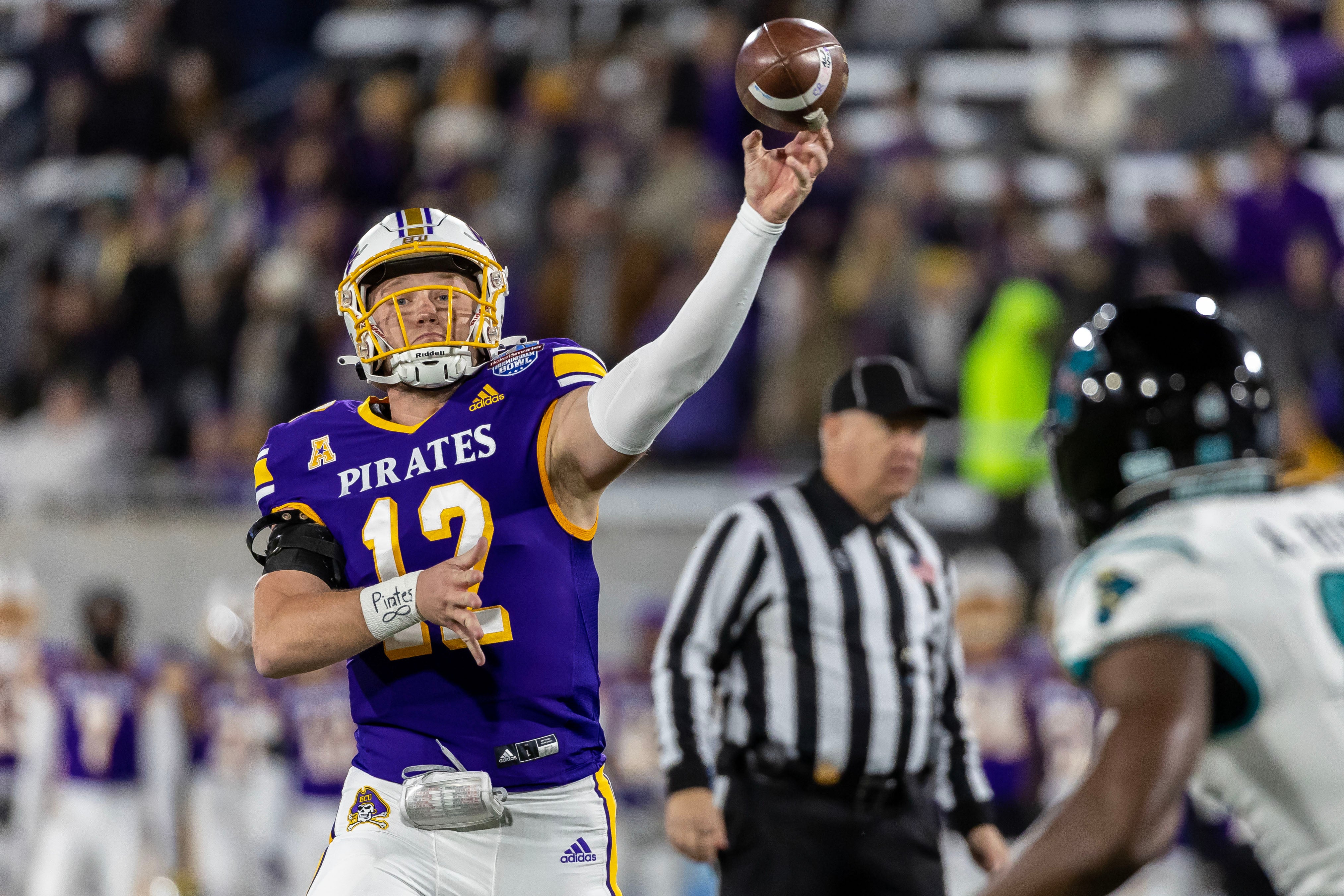 Dec 27, 2022; Birmingham, Alabama, USA; East Carolina Pirates quarterback Holton Ahlers (12) throws a pass against the Coastal Carolina Chanticleers in the 2022 Birmingham Bowl at Protective Stadium.