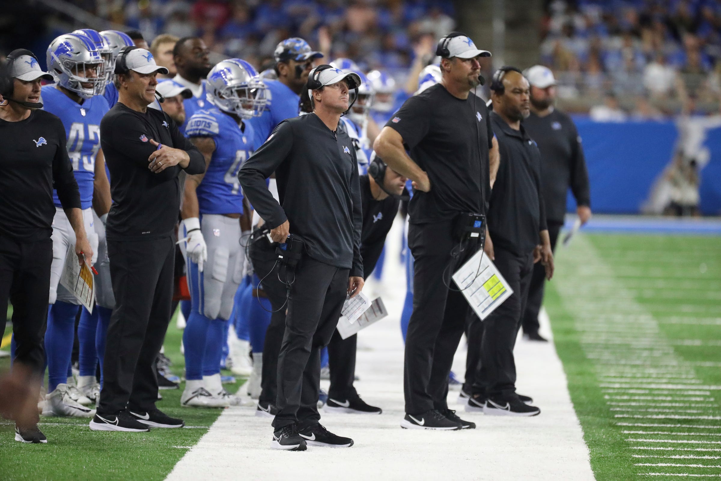Lions offensive coordinator Ben Johnson, left, and head coach Dan Campbell on the sidelines during the second half of the Lions' 27-23 preseason loss to the Falcons on Friday, Aug. 12, 2022 at Ford Field. Lions Atl
