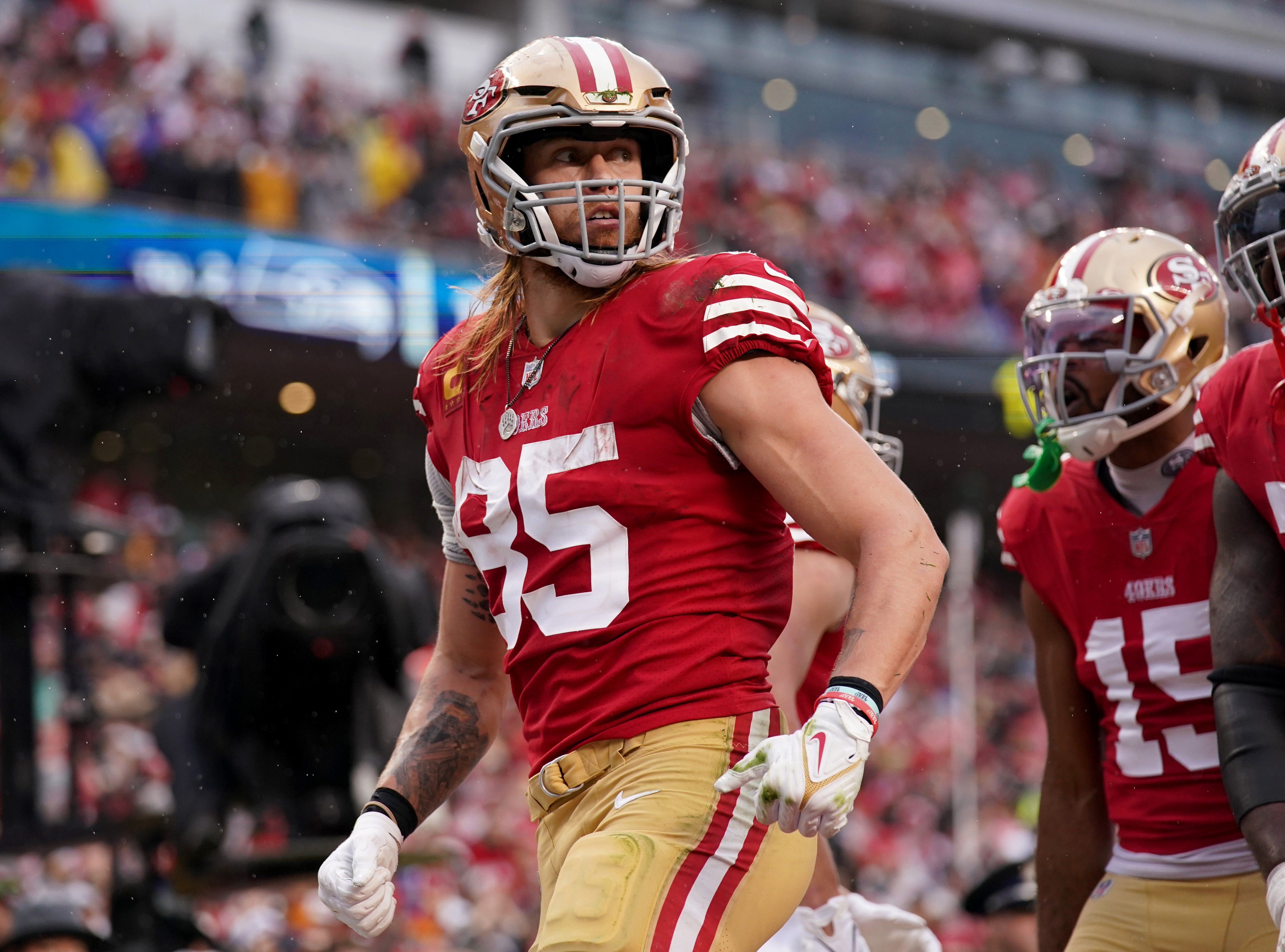 Jan 14, 2023; Santa Clara, California, USA; San Francisco 49ers tight end George Kittle (85) after catching a pass for a two-point conversion in the third quarter of a wild card game against the Seattle Seahawks at Levi's Stadium.