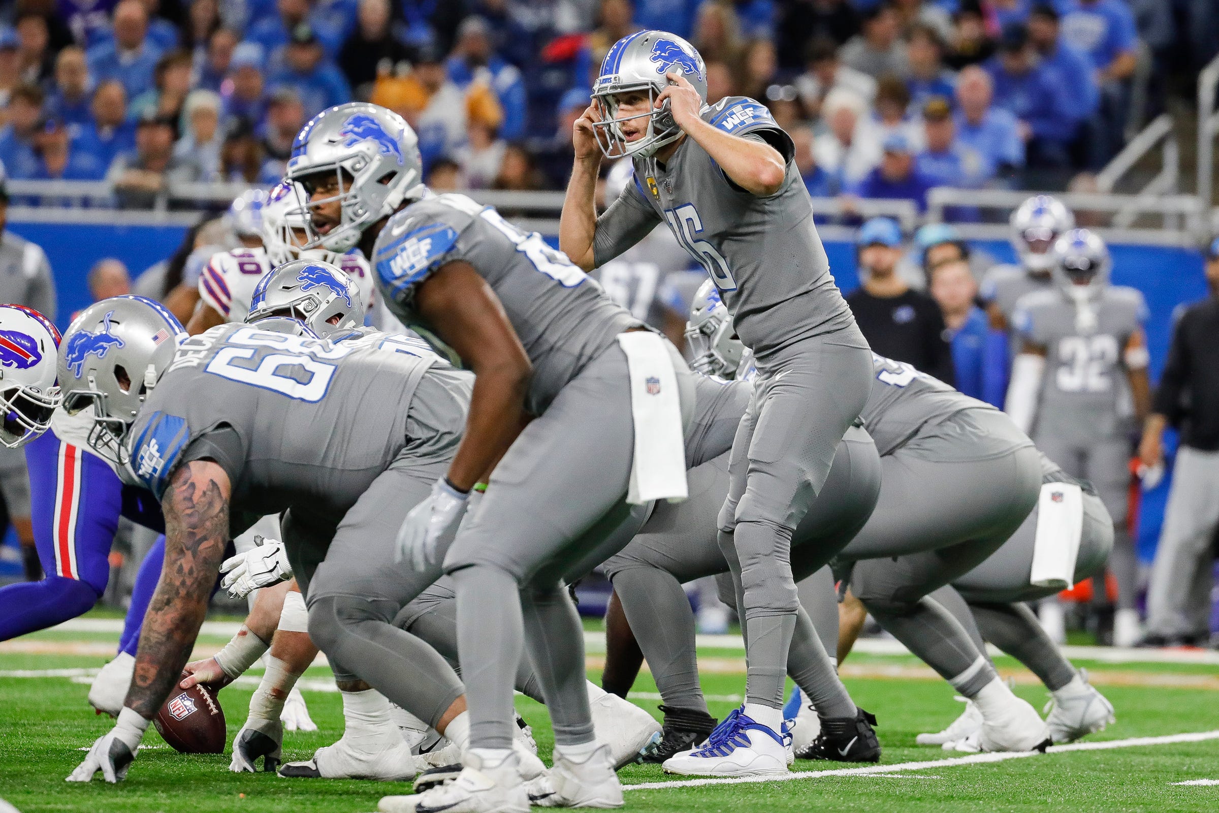 Detroit Lions quarterback Jared Goff (16) signals teammates before a snap against the Buffalo Bills during the second half at Ford Field in Detroit on Thursday, Nov. 24, 2022.