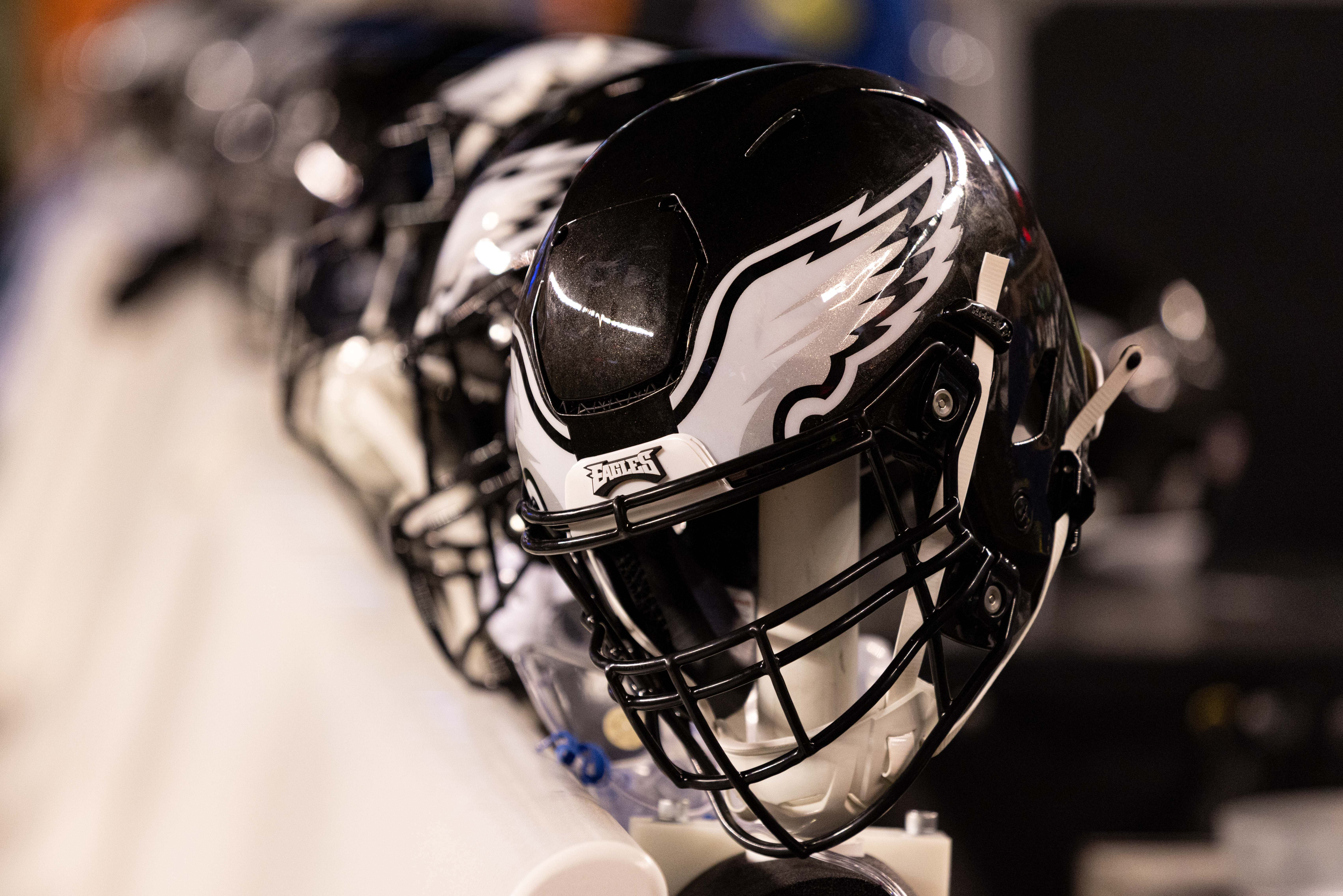 Nov 27, 2022; Philadelphia, Pennsylvania, USA; Philadelphia Eagles helmets on the players bench in a game against the Green Bay Packers at Lincoln Financial Field. Mandatory Credit: Bill Streicher-USA TODAY Sports