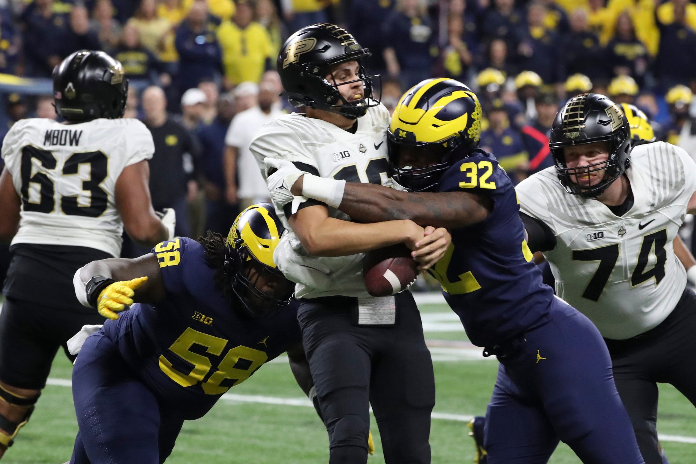Dallas Cowboys first-round pick Mazi Smith getting the sack with the Michigan Wolverines