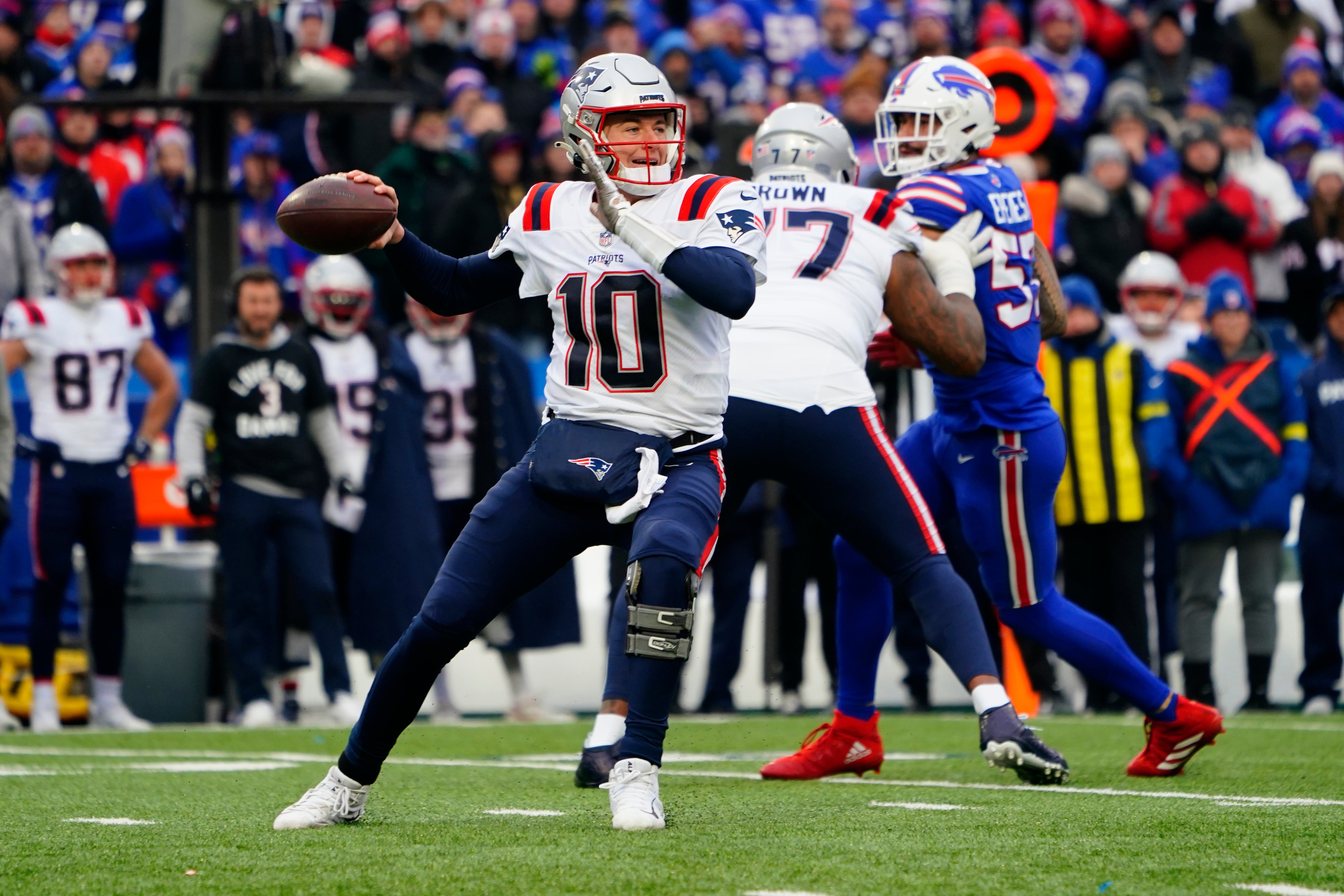 Mac Jones drops back to pass during the final game of the 2022 NFL season.