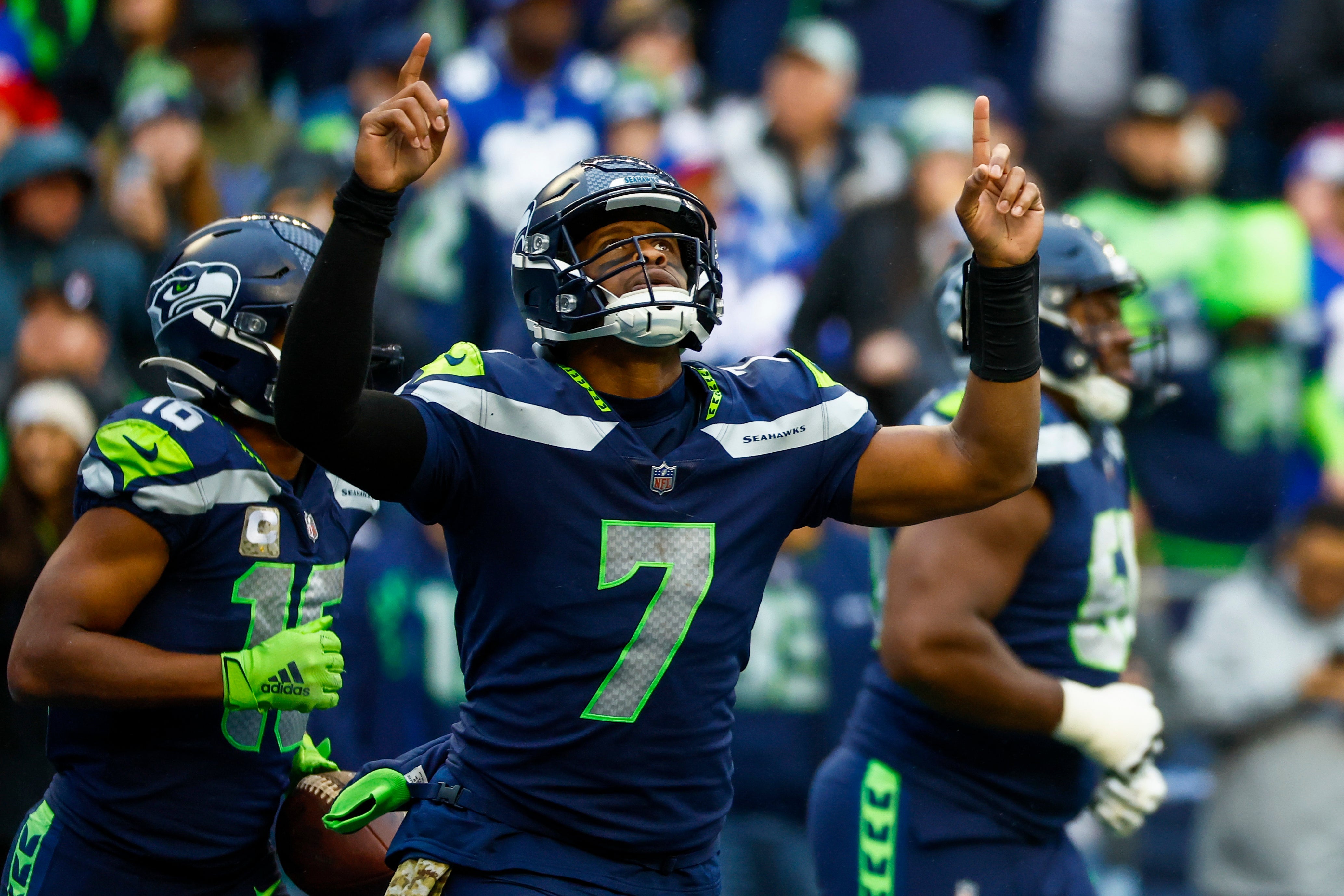 Oct 30, 2022; Seattle, Washington, USA; Seattle Seahawks quarterback Geno Smith (7) celebrates after throwing a touchdown pass against the New York Giants during the fourth quarter at Lumen Field.