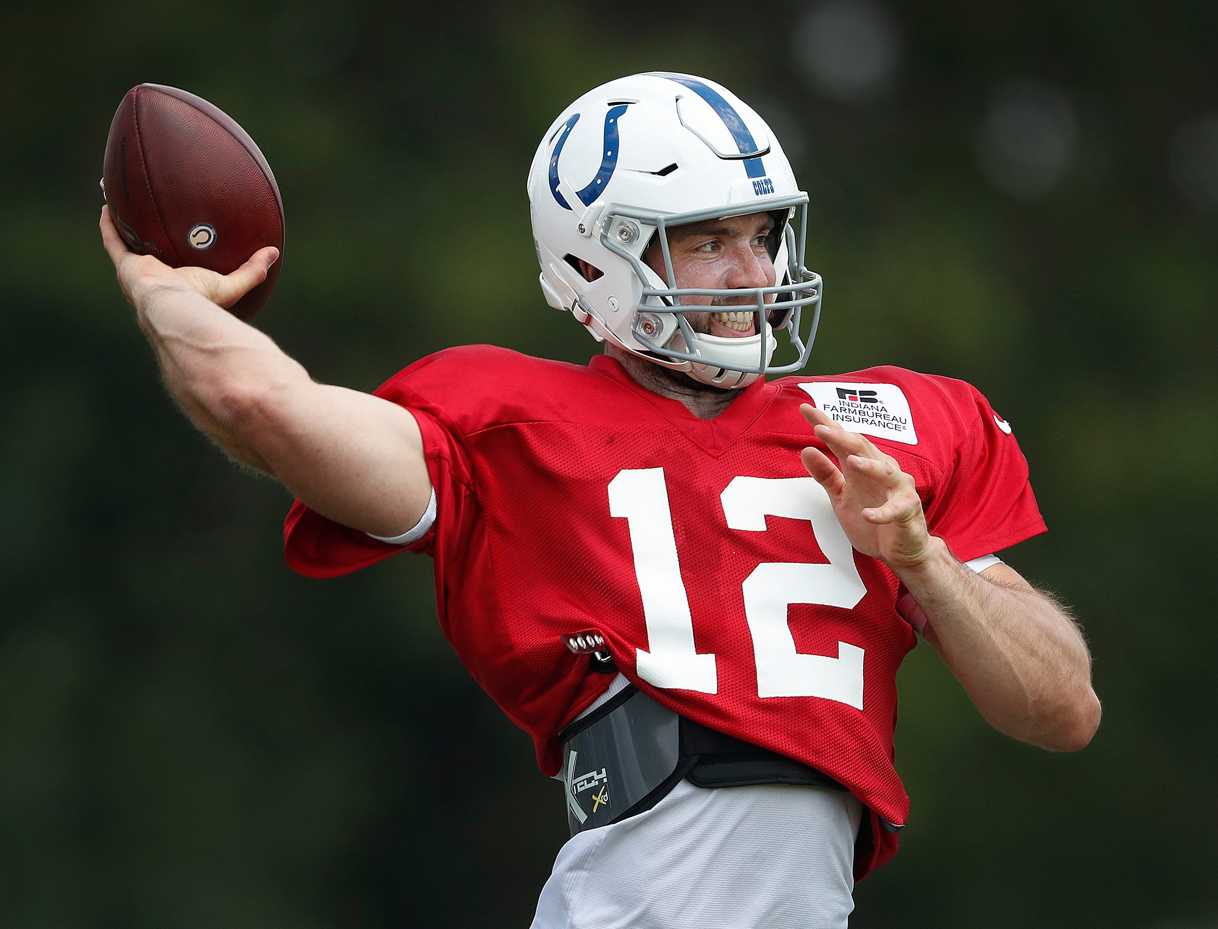 Former Indianapolis Colts quarterback Andrew Luck throwing in practice.