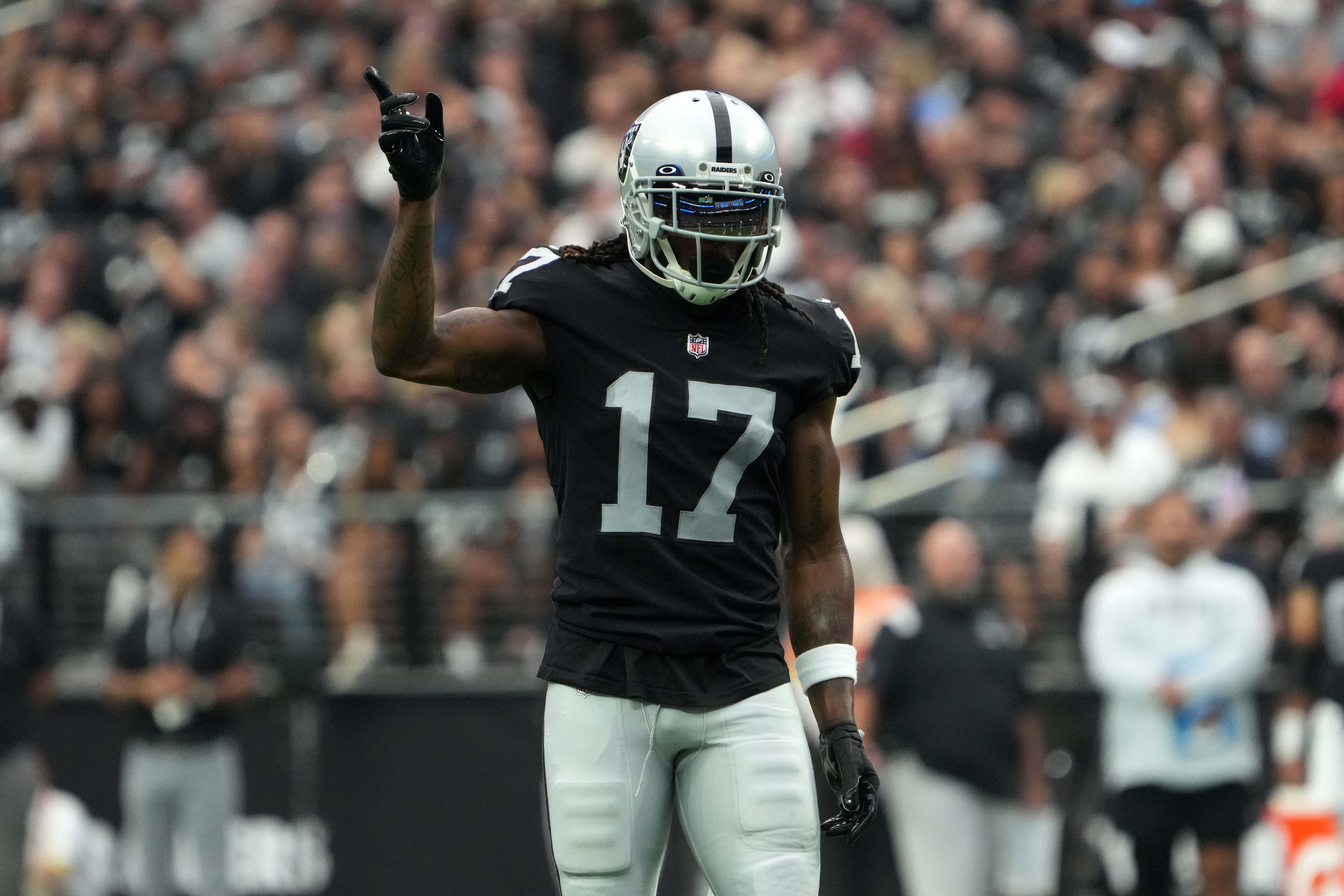 Sep 18, 2022; Paradise, Nevada, USA; Las Vegas Raiders wide receiver Davante Adams (17) reacts against the Arizona Cardinals in the second half at Allegiant Stadium. Mandatory Credit: Kirby Lee-USA TODAY Sports.