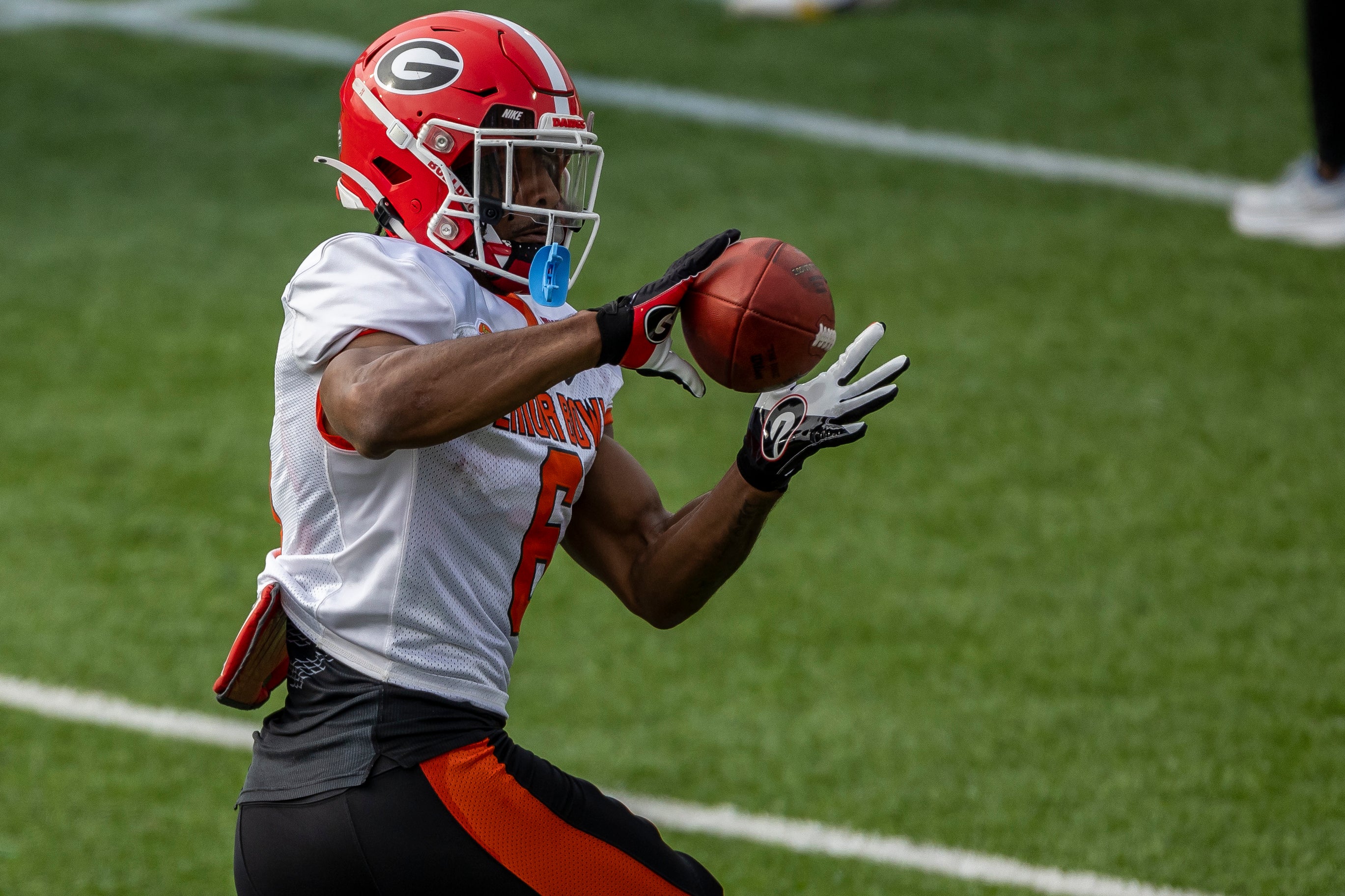 Feb 1, 2023; Mobile, AL, USA; American running back Kenny McIntosh of Georgia (6) practices during the second day of Senior Bowl week at Hancock Whitney Stadium in Mobile.