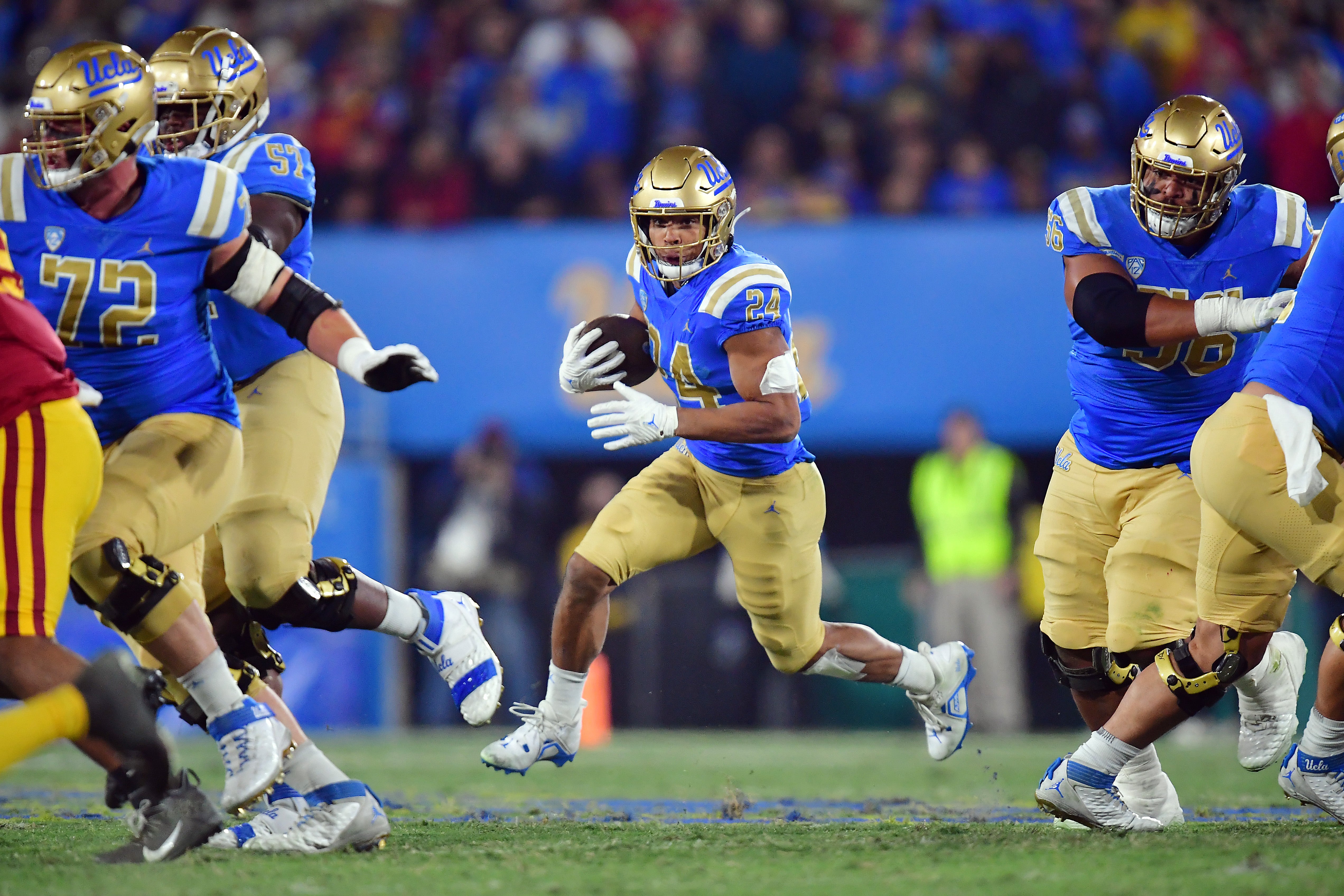 Nov 19, 2022; Pasadena, California, USA; UCLA Bruins running back Zach Charbonnet (24) runs the ball against the Southern California Trojans during the first half at the Rose Bowl.