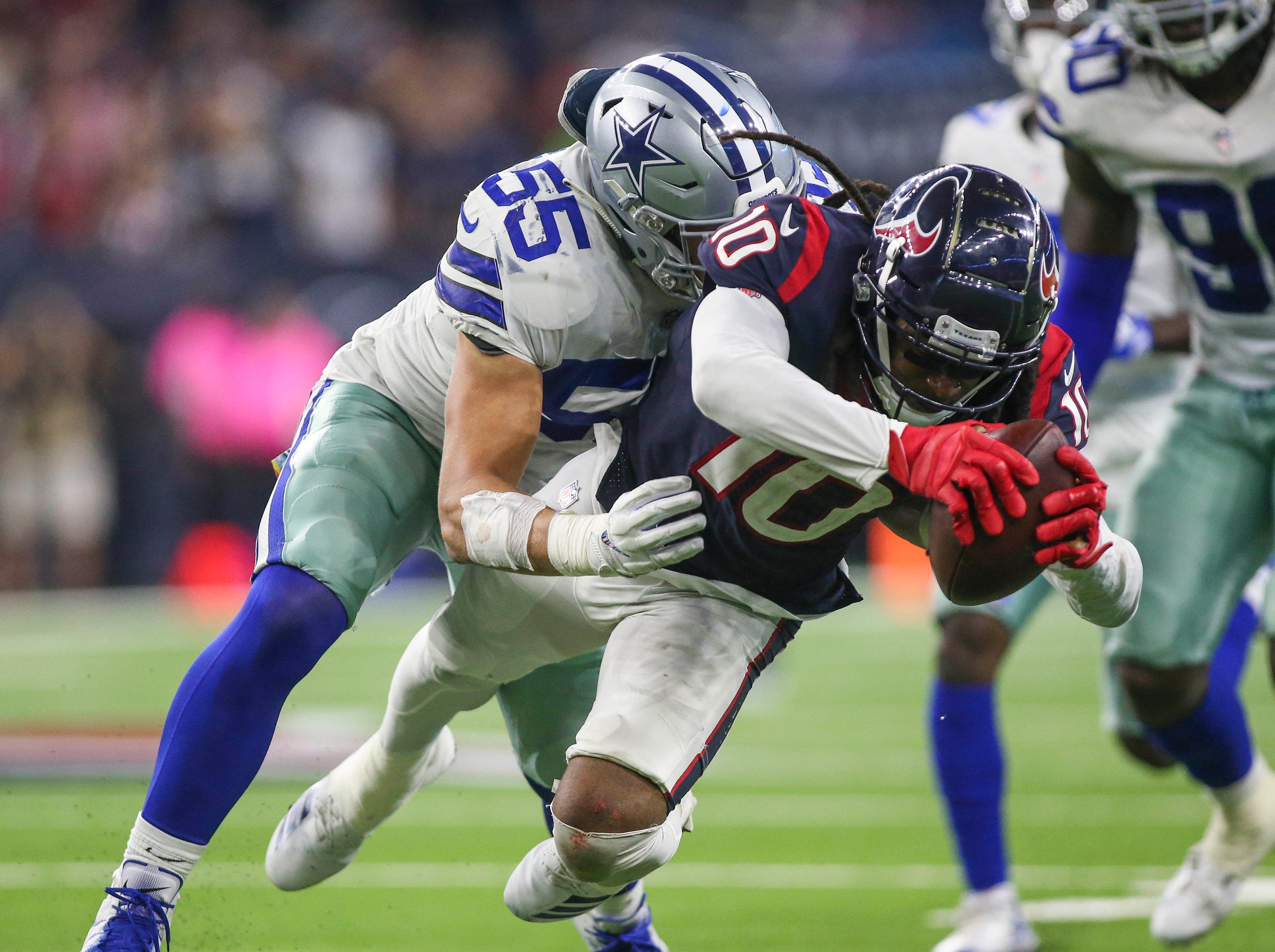 Dallas Cowboys LB Leighton Vander Esch tackling DeAndre Hopkins