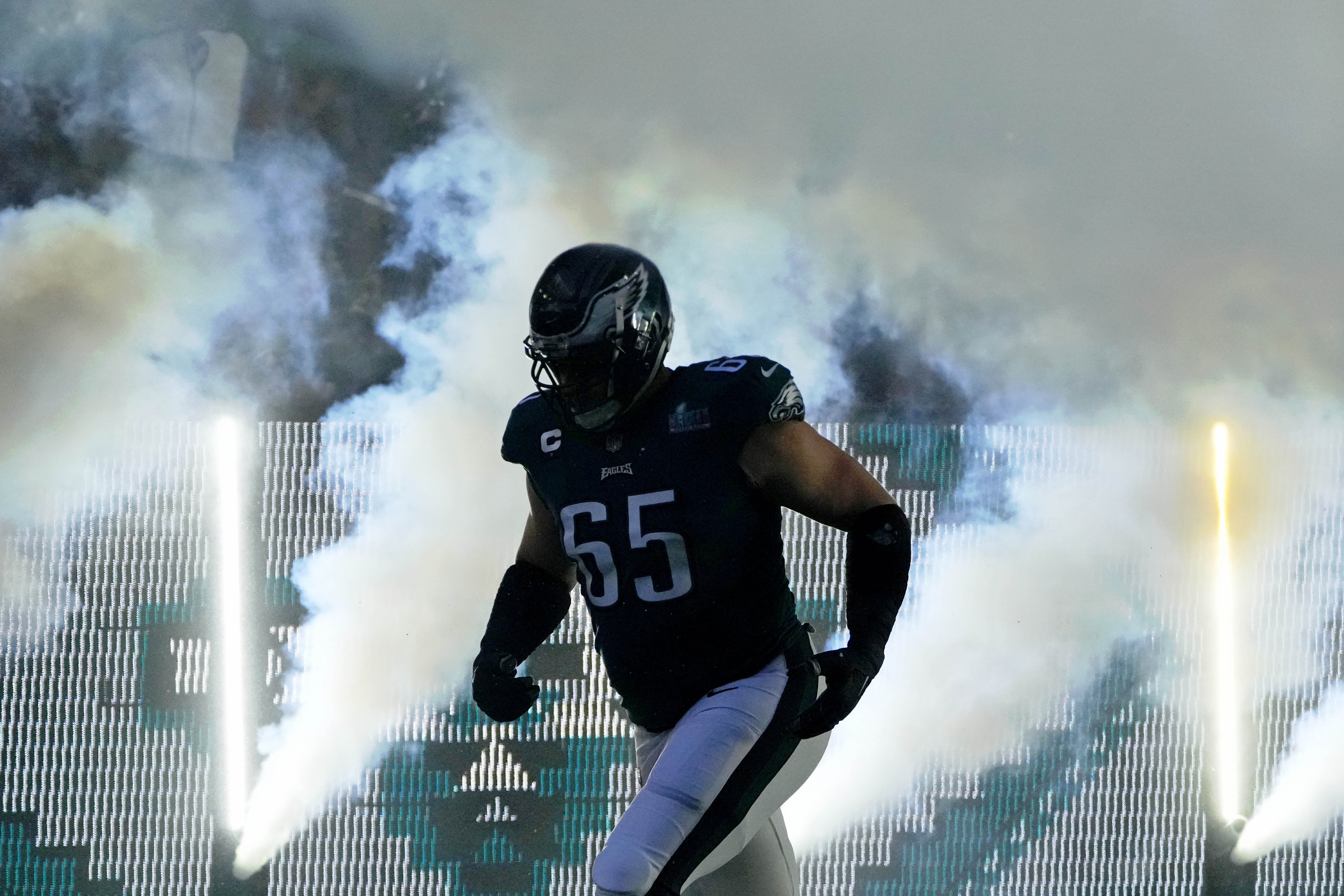 Feb 12, 2023; Glendale, Arizona, US; Philadelphia Eagles offensive tackle Lane Johnson (65) runs onto the field before Super Bowl LVII against the Kansas City Chiefs at State Farm Stadium.