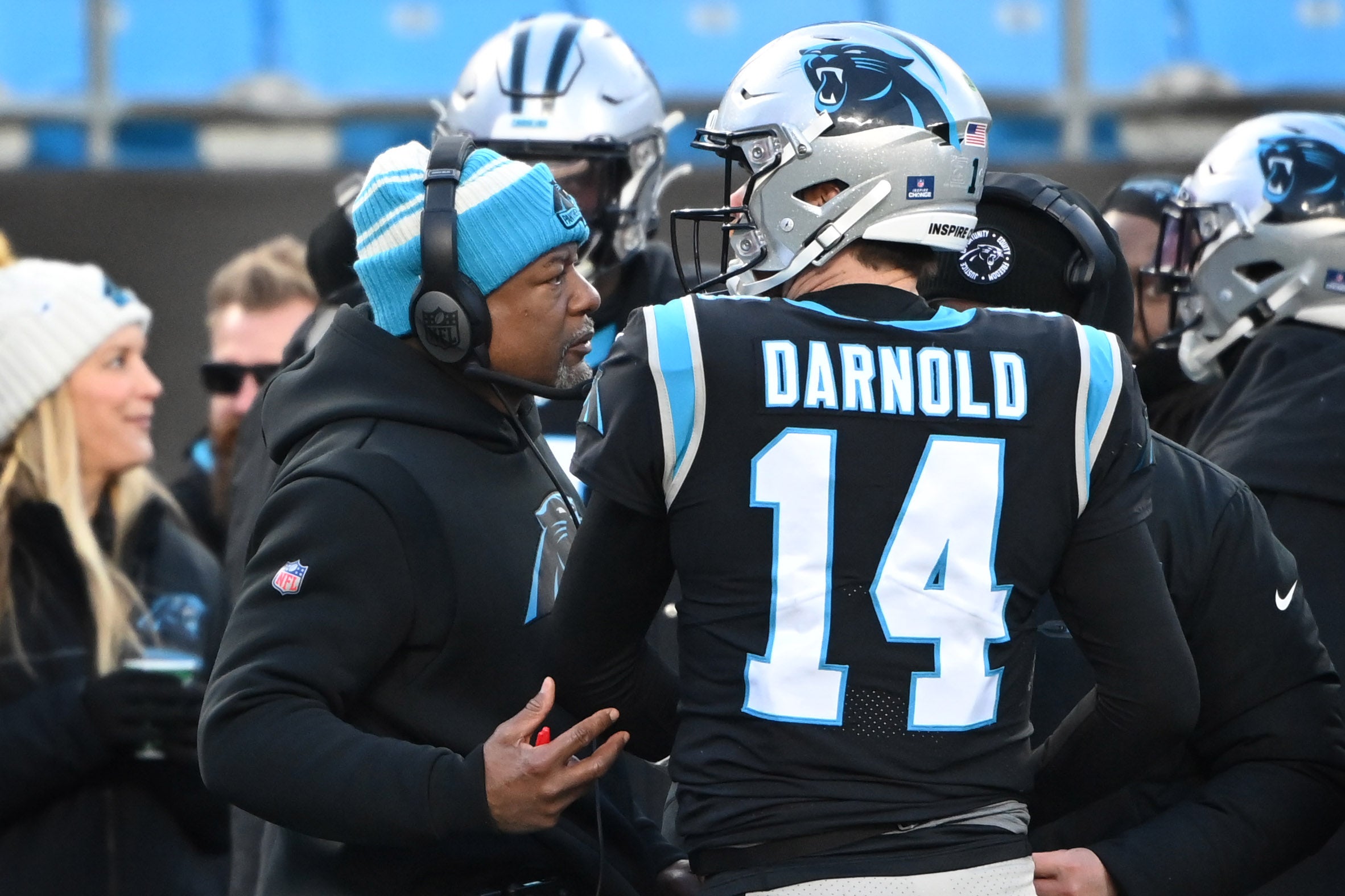 Dec 24, 2022; Charlotte, North Carolina, USA; Carolina Panthers head coach Steve Wilks with quarterback Sam Darnold (14) in the fourth quarter at Bank of America Stadium.