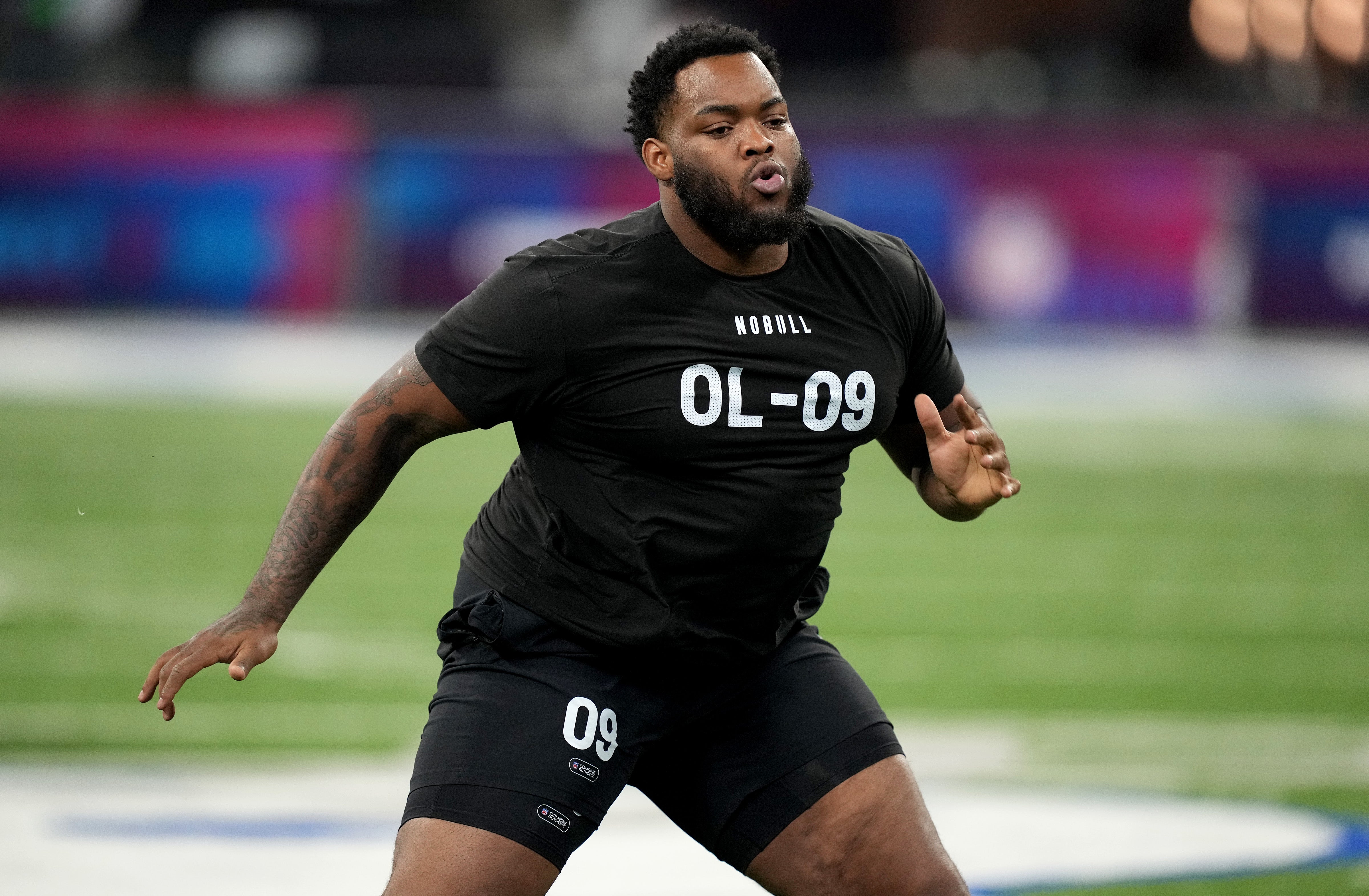 Mar 5, 2023; Indianapolis, IN, USA; Louisiana State offensive lineman Anthony Bradford (OL09) during the NFL Scouting Combine at Lucas Oil Stadium.