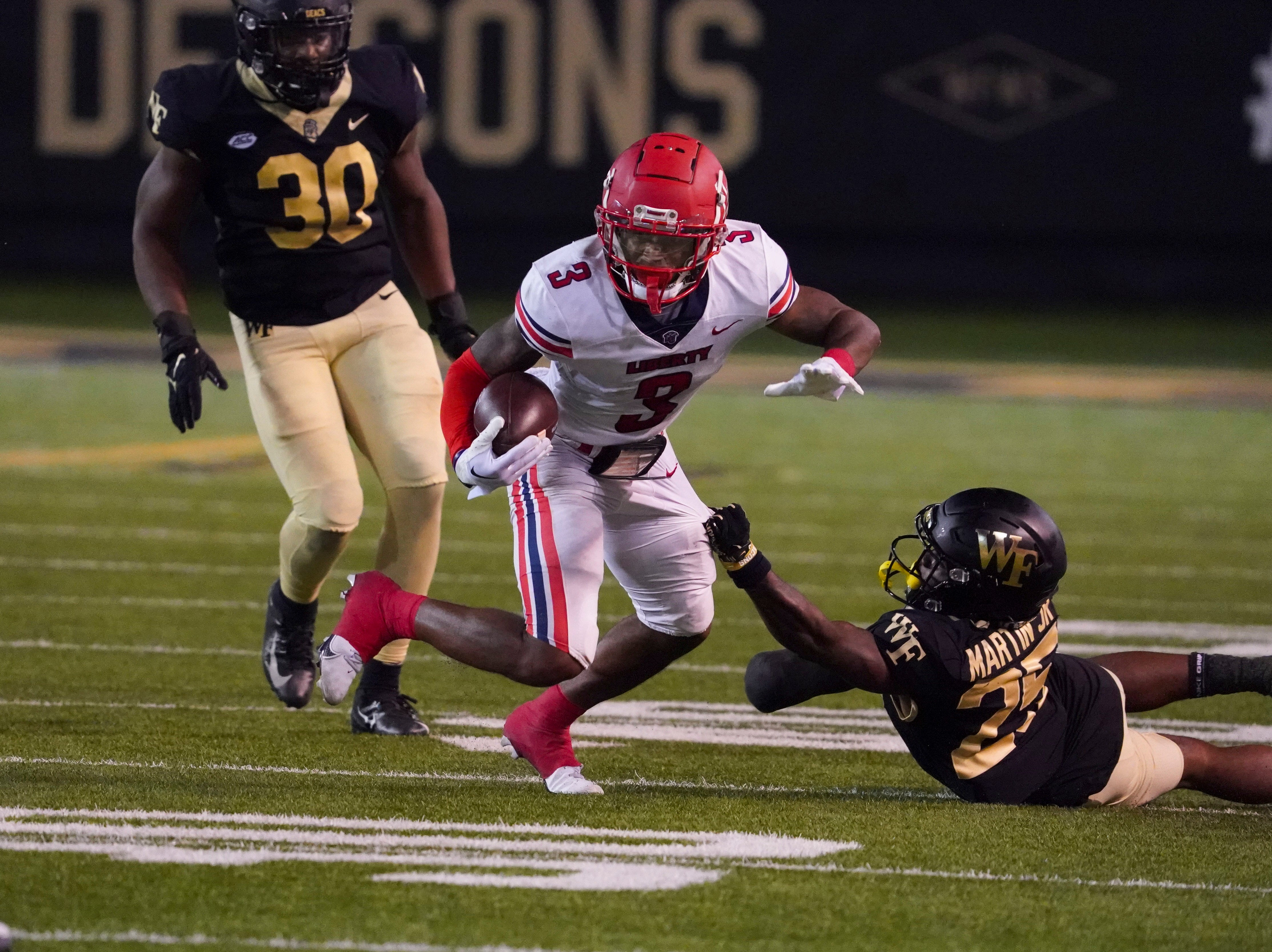 Patriots sixth-round rookie wide receiver Demario Douglas with a reception against Wake Forest in 2022.