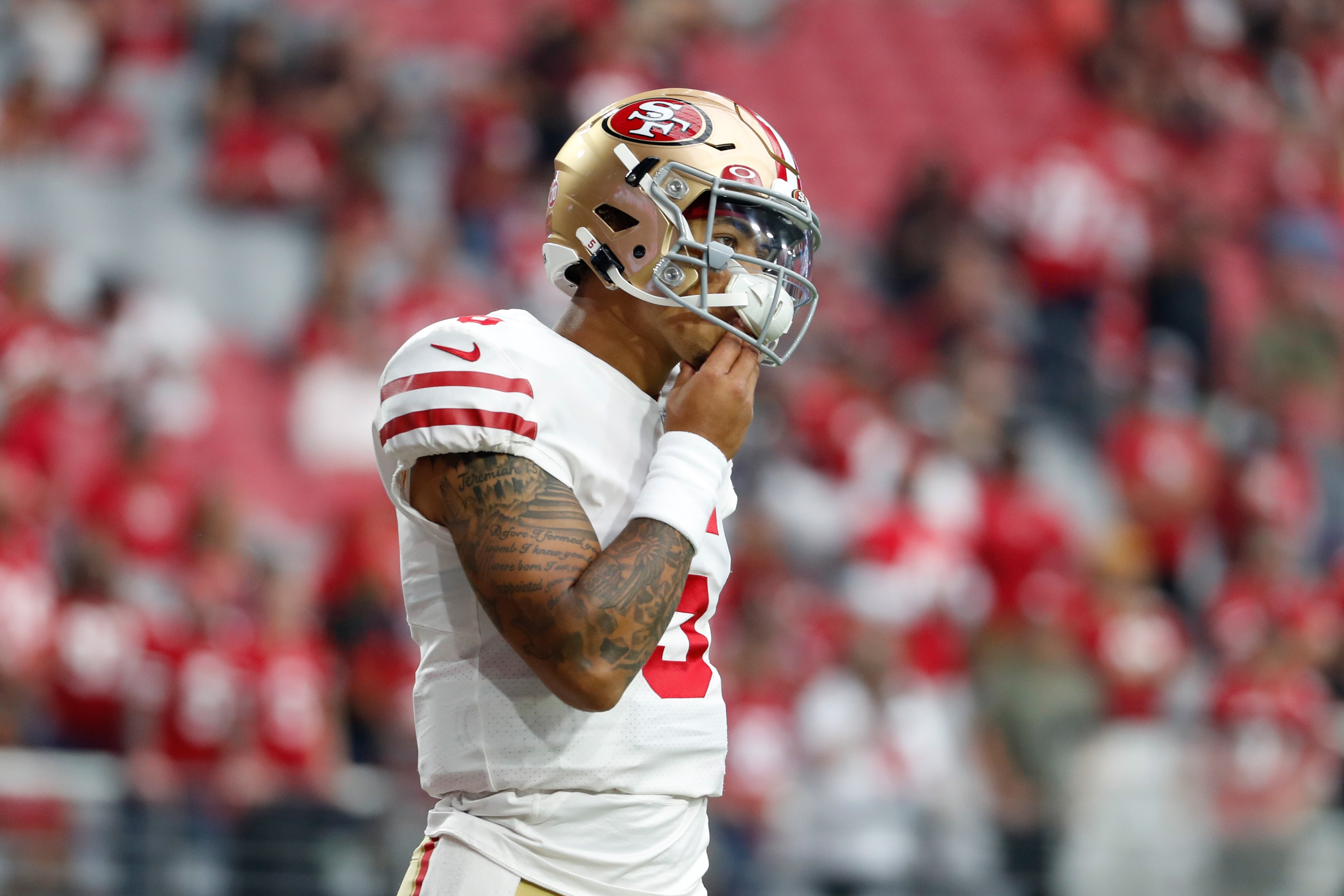 Oct 10, 2021; Glendale, Arizona, USA; San Francisco 49ers quarterback Trey Lance (5) warms up before the game against the Arizona Cardinals at State Farm Stadium.