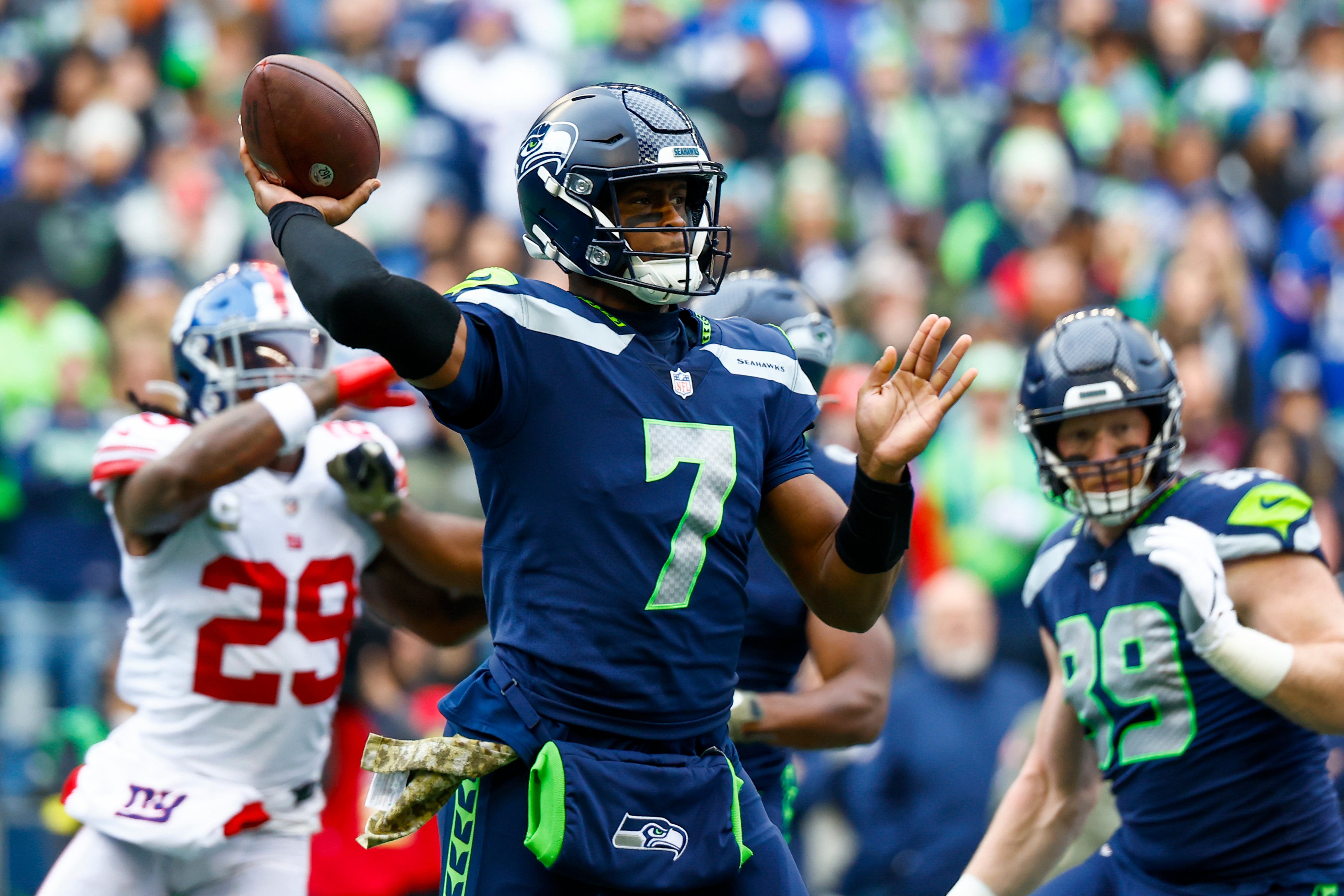 Oct 30, 2022; Seattle, Washington, USA; Seattle Seahawks quarterback Geno Smith (7) passes against the New York Giants during the first quarter at Lumen Field.