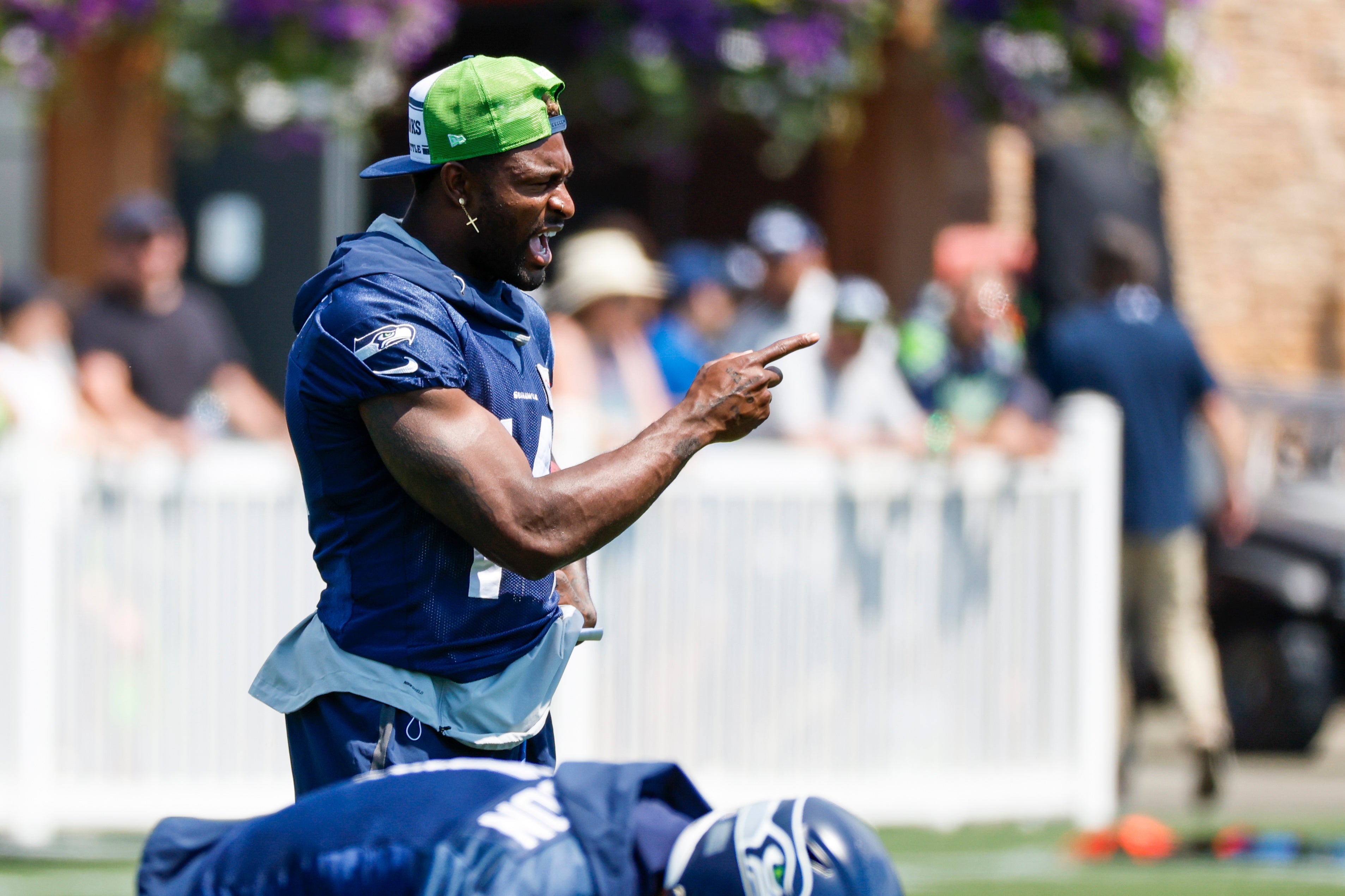 Renton, WA, USA; Seattle Seahawks wide receiver D.K. Metcalf (14) talks with teammates during training camp practice at Virginia Mason Athletic Center.