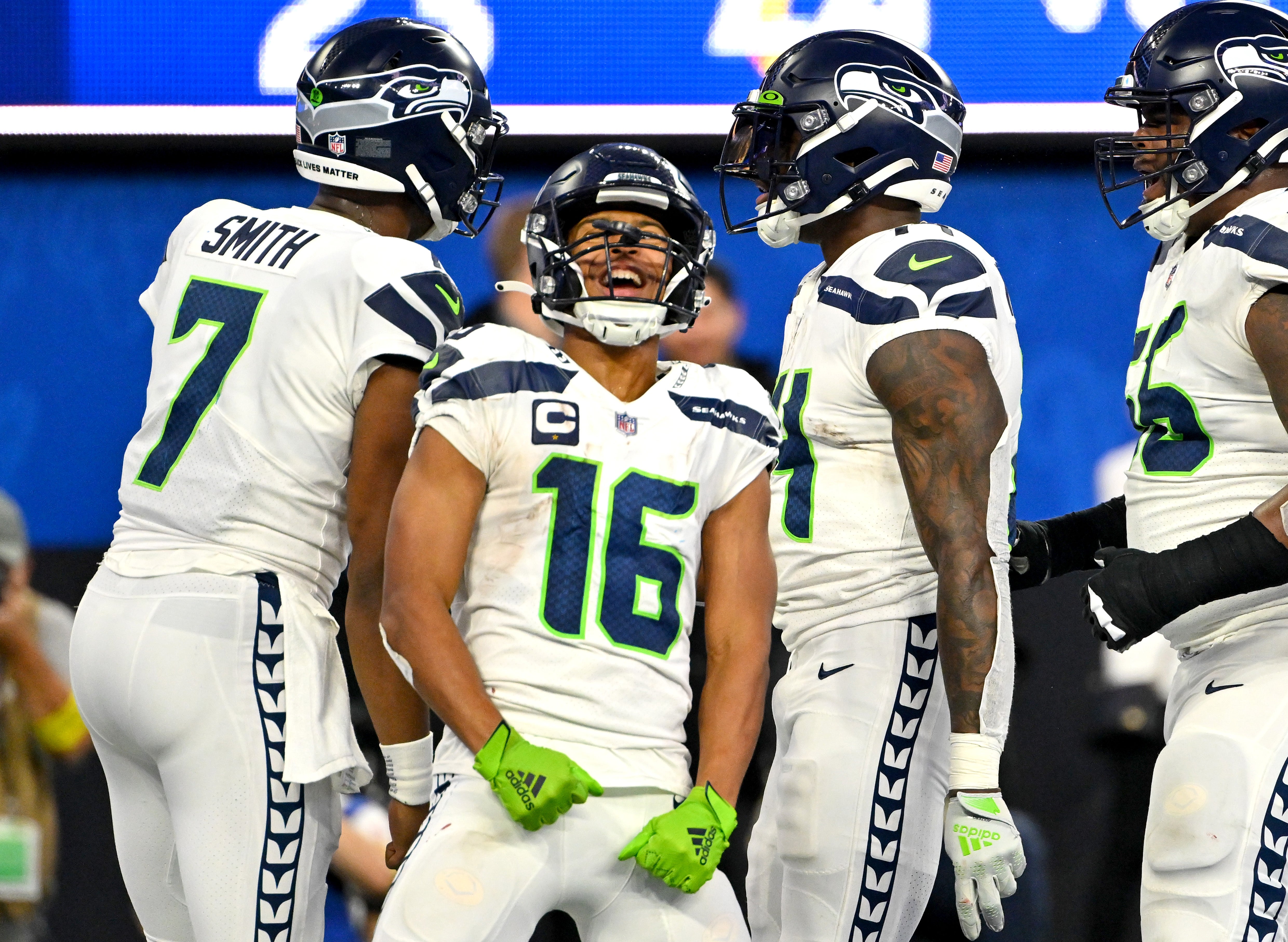 Dec 4, 2022; Inglewood, California, USA; Seattle Seahawks wide receiver Tyler Lockett (16) celebrates with quarterback Geno Smith (7) and wide receiver DK Metcalf (14) after a touchdown in the fourth quarter against the Los Angeles Rams at SoFi Stadium.