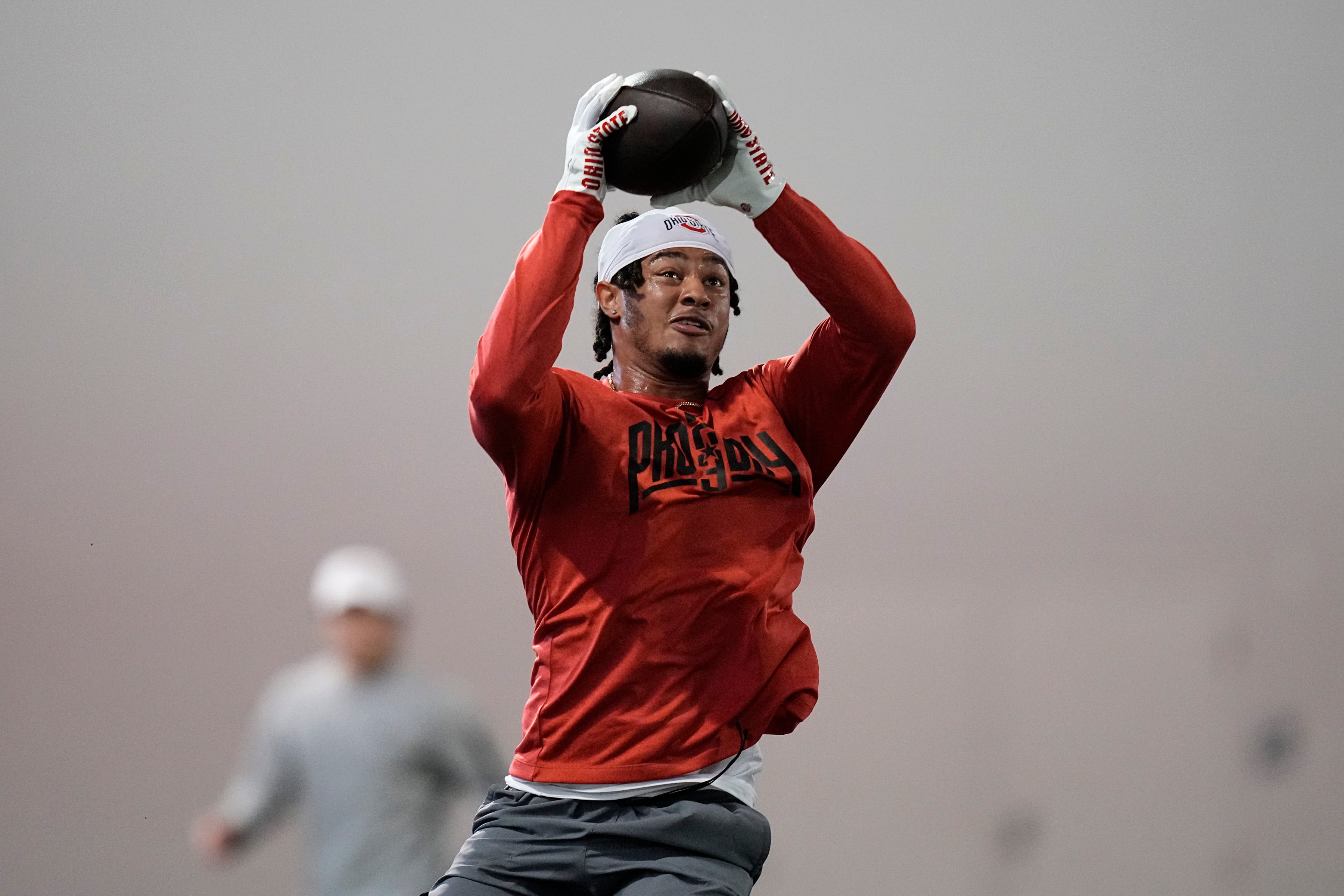 Ohio State Buckeyes wide receiver Jaxon Smith-Njigba catches a ball during Ohio State football s pro day at the Woody Hayes Athletic Center in Columbus on March 22, 2023. Football Ceb Osufb Pro Day.