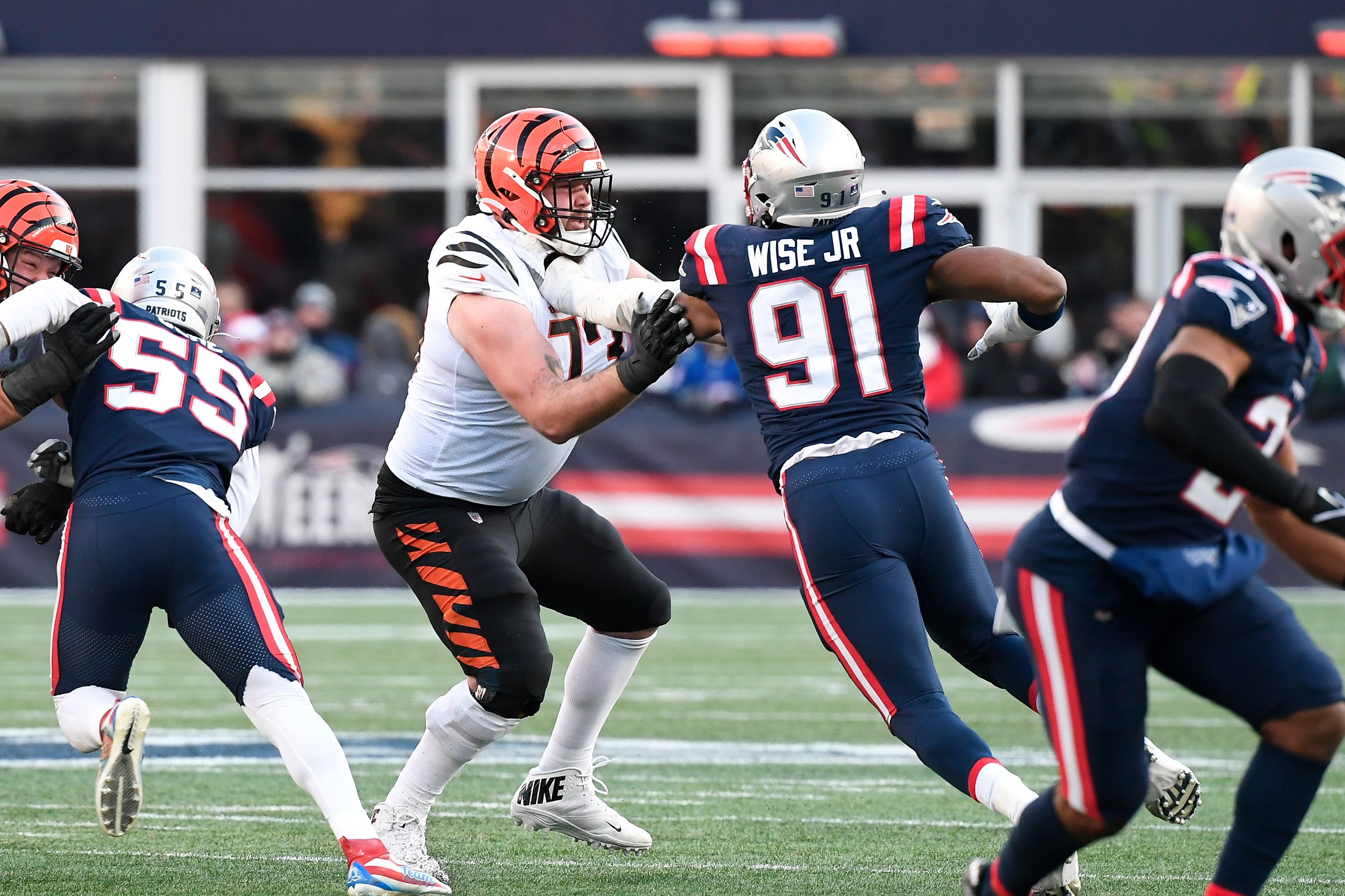 Dec 24, 2022; Foxborough, Massachusetts, USA; Cincinnati Bengals offensive tackle Jonah Williams (73) blocks New England Patriots defensive end Deatrich Wise Jr. (91) during the first half at Gillette Stadium.