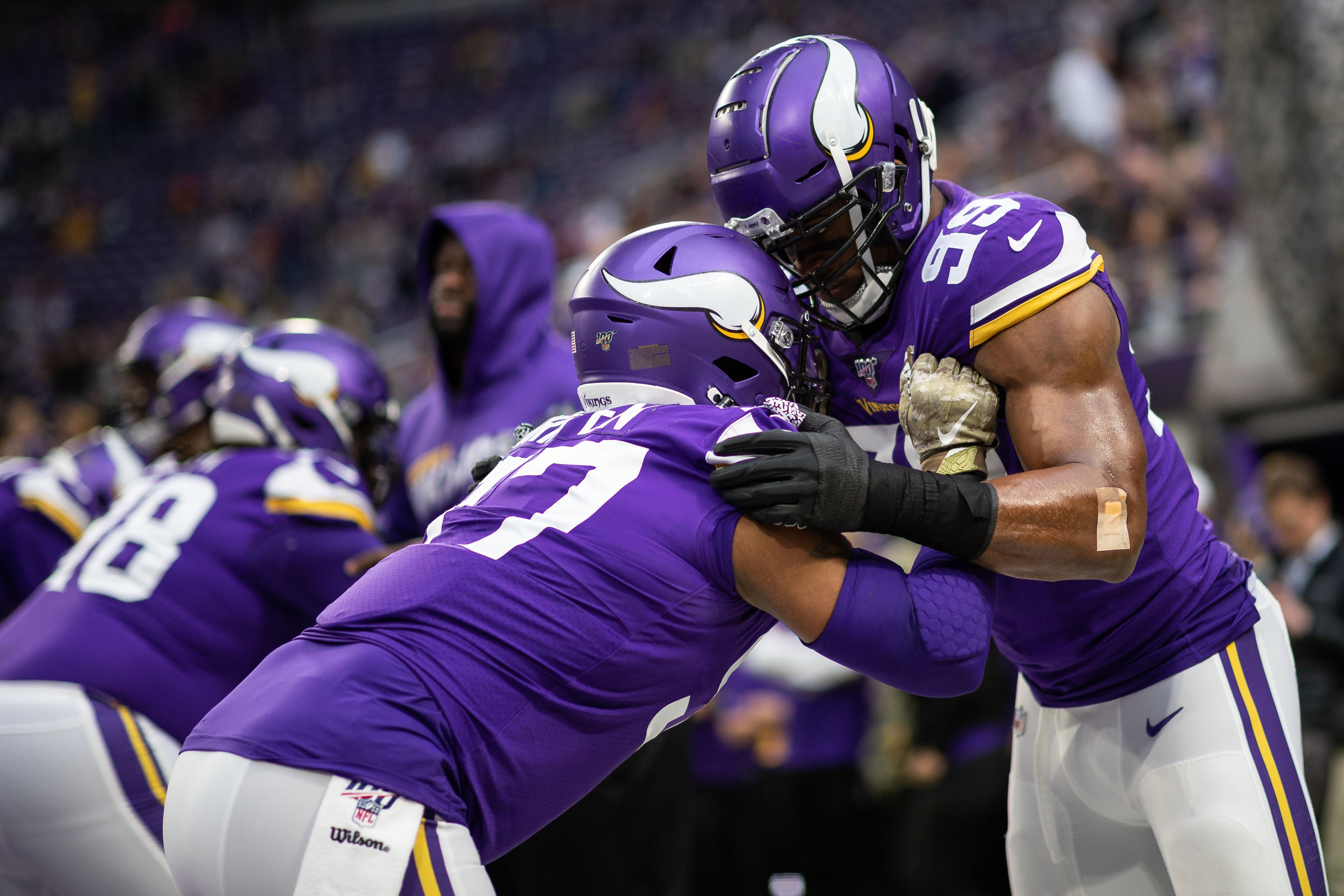 Dec 29, 2019; Minneapolis, Minnesota, USA; Minnesota Vikings defensive end Everson Griffen (97) and defensive end Danielle Hunter (99) warm up prior to the game against the Chicago Bears at U.S. Bank Stadium.