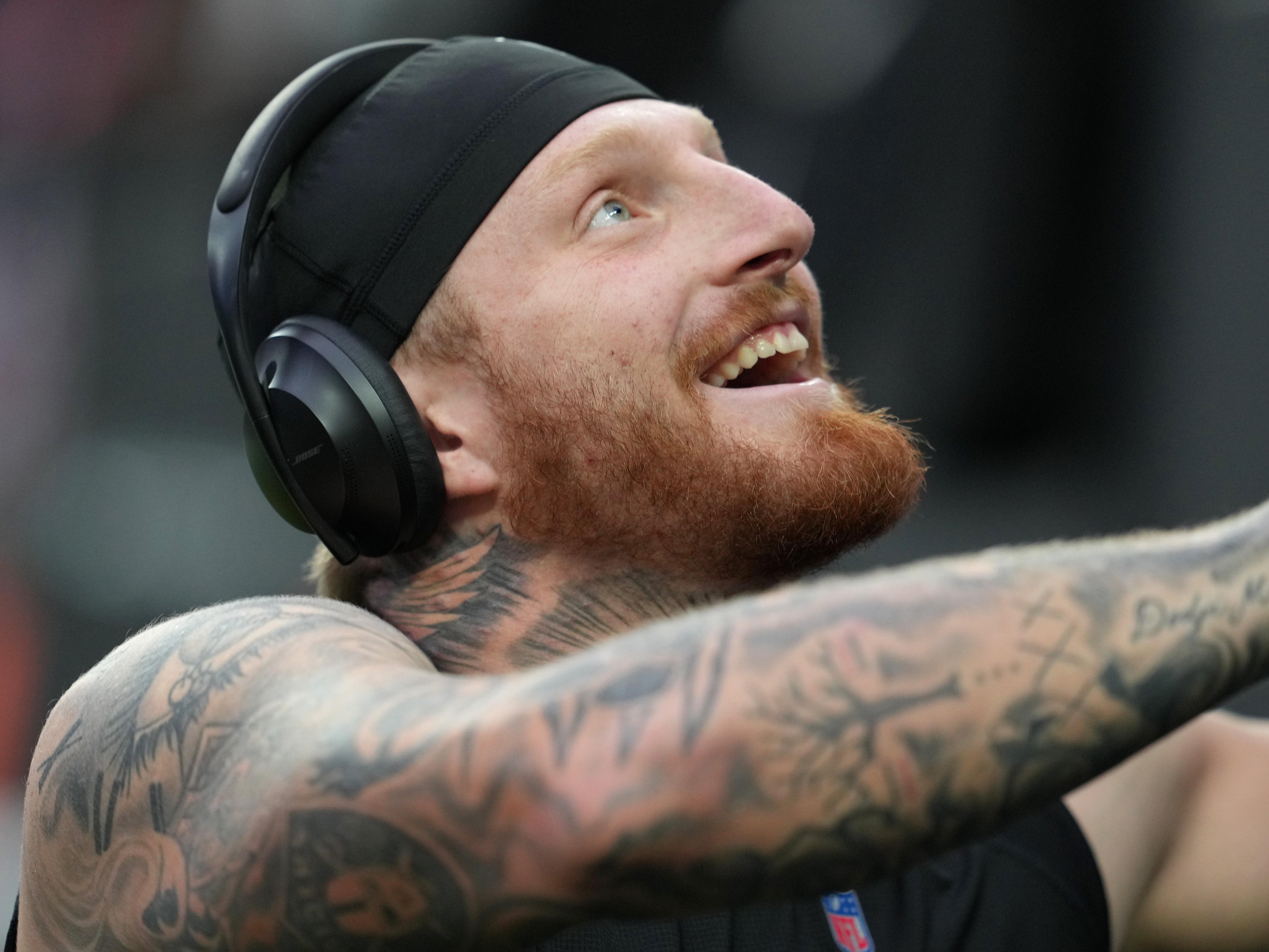 Dec 4, 2022; Paradise, Nevada, USA; Las Vegas Raiders defensive end Maxx Crosby (98) signs autographs before a game against the Los Angeles Chargers at Allegiant Stadium.