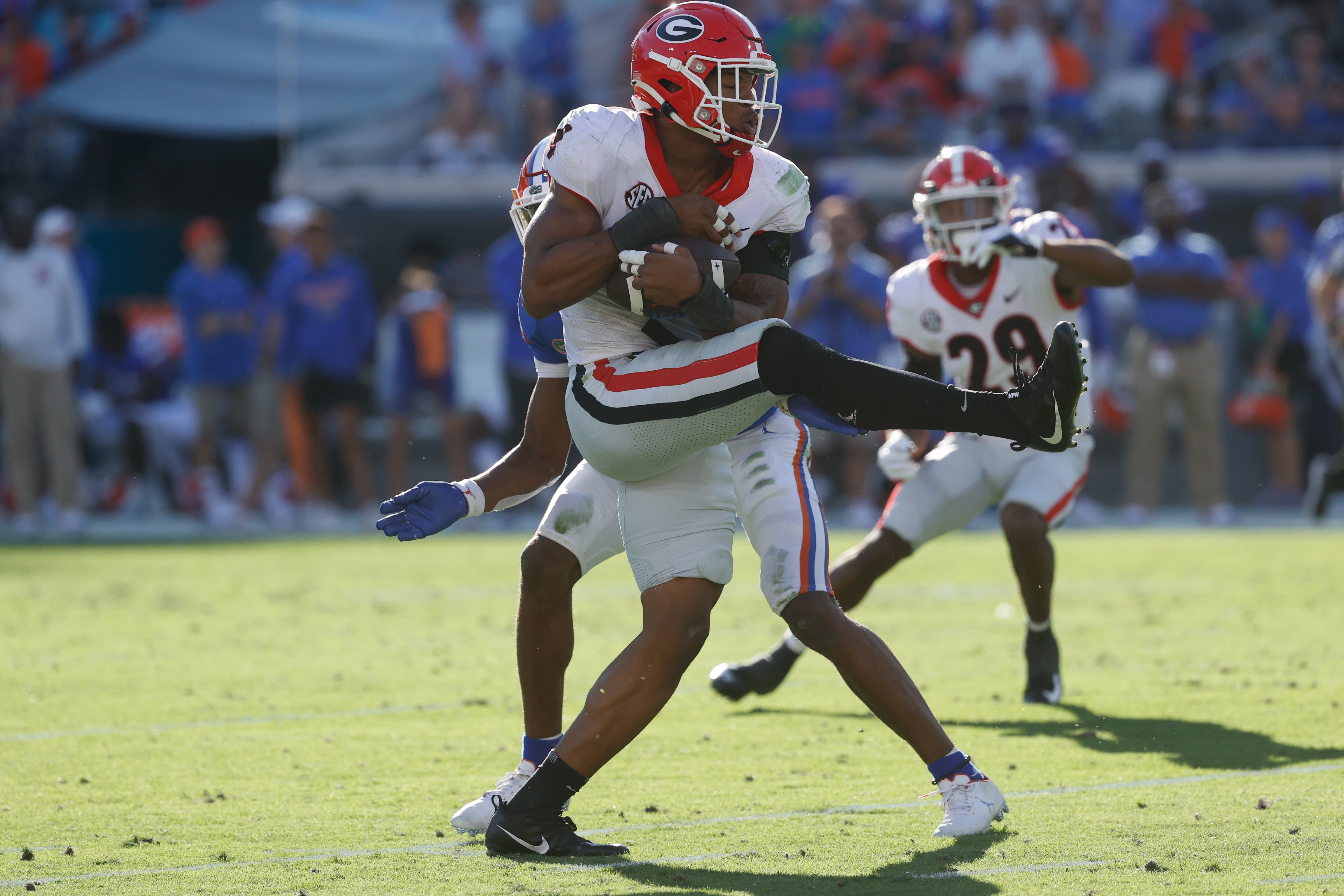 Oct 30, 2021; Jacksonville, Florida, USA; Georgia Bulldogs linebacker Nolan Smith (4) intercepted the ball against the Florida Gators during the first half at TIAA Bank Field.