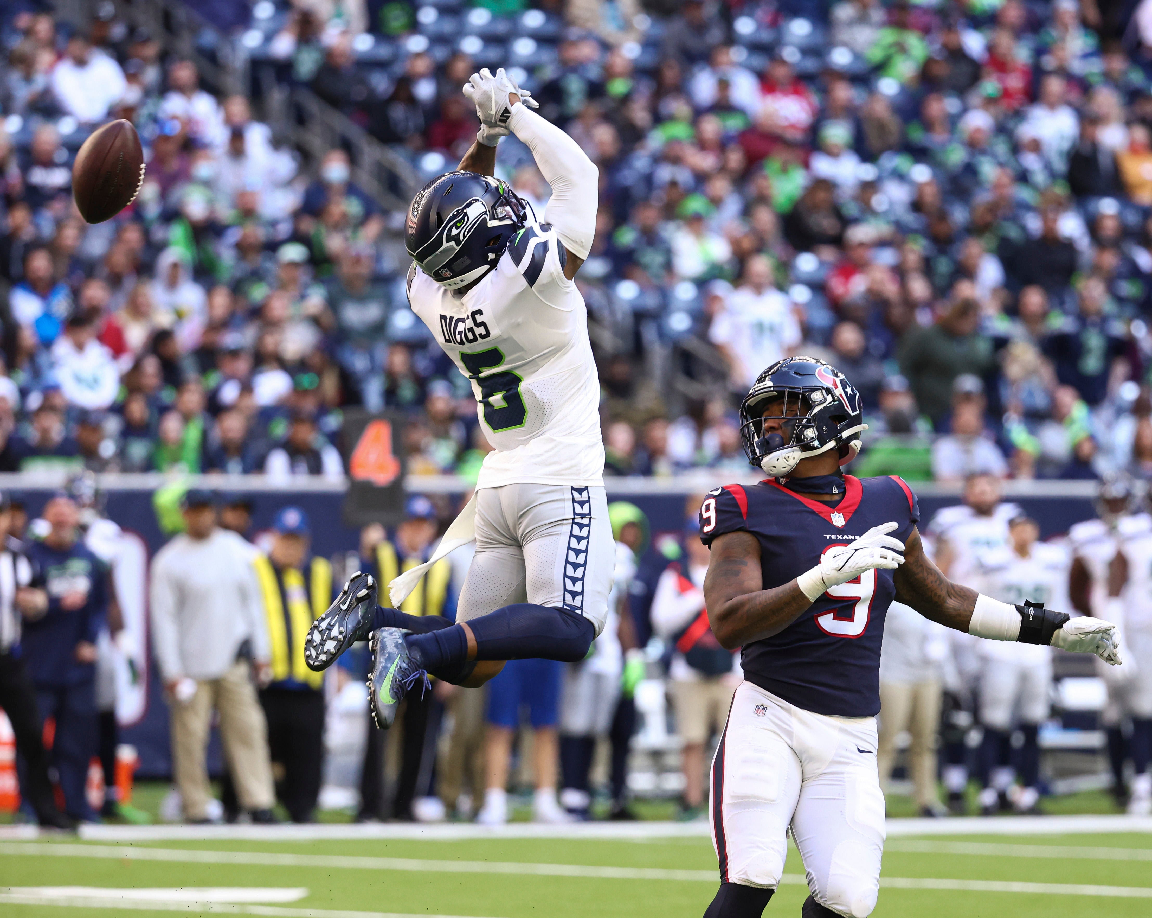 Dec 12, 2021; Houston, Texas, USA; Seattle Seahawks free safety Quandre Diggs (6) attempts to intercept a pass intended for Houston Texans tight end Brevin Jordan (9) during the fourth quarter at NRG Stadium.