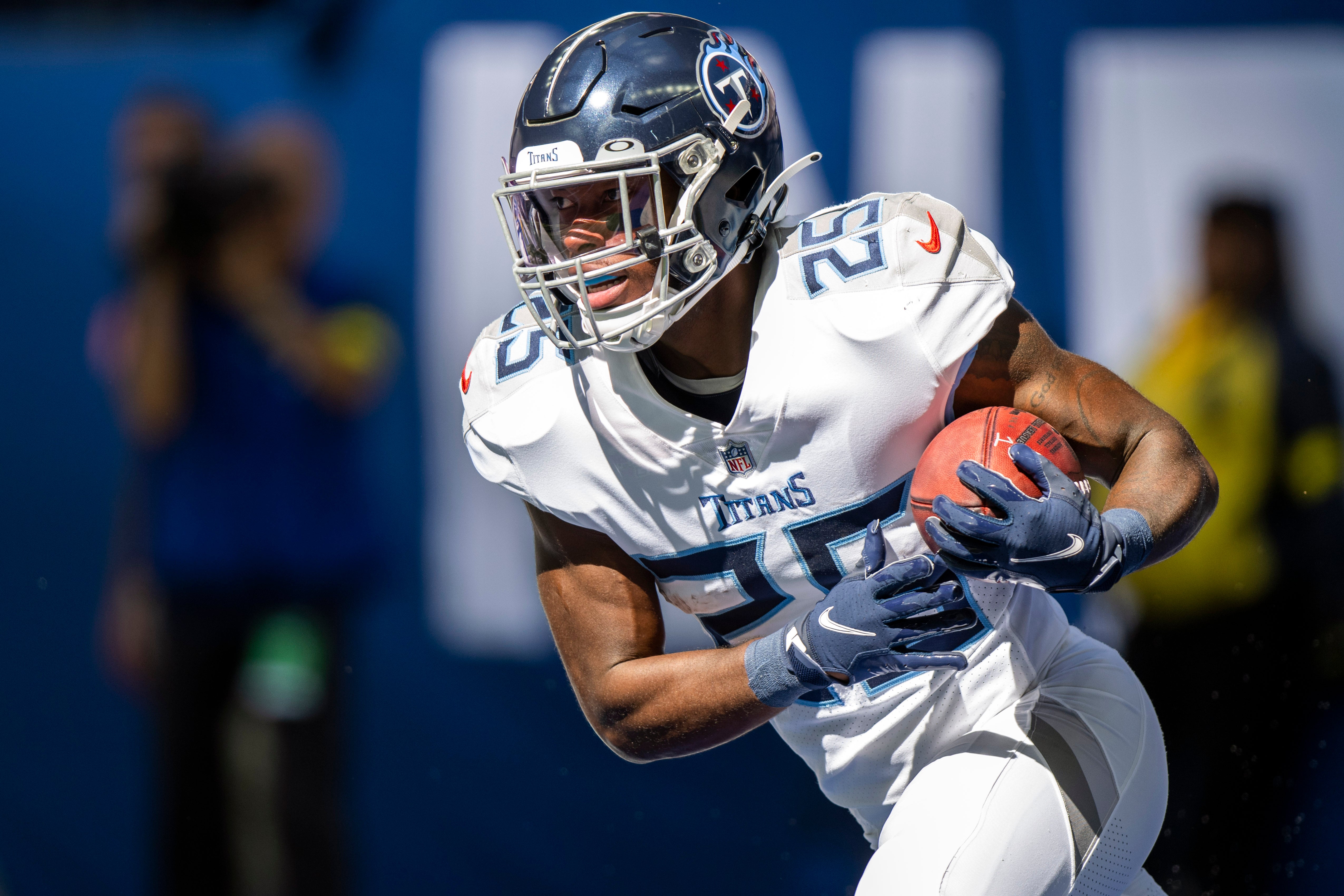 Oct 2, 2022; Indianapolis, Indiana, USA; Tennessee Titans running back Hassan Haskins (25) returns a kickoff during the second quarter against the Indianapolis Colts at Lucas Oil Stadium.