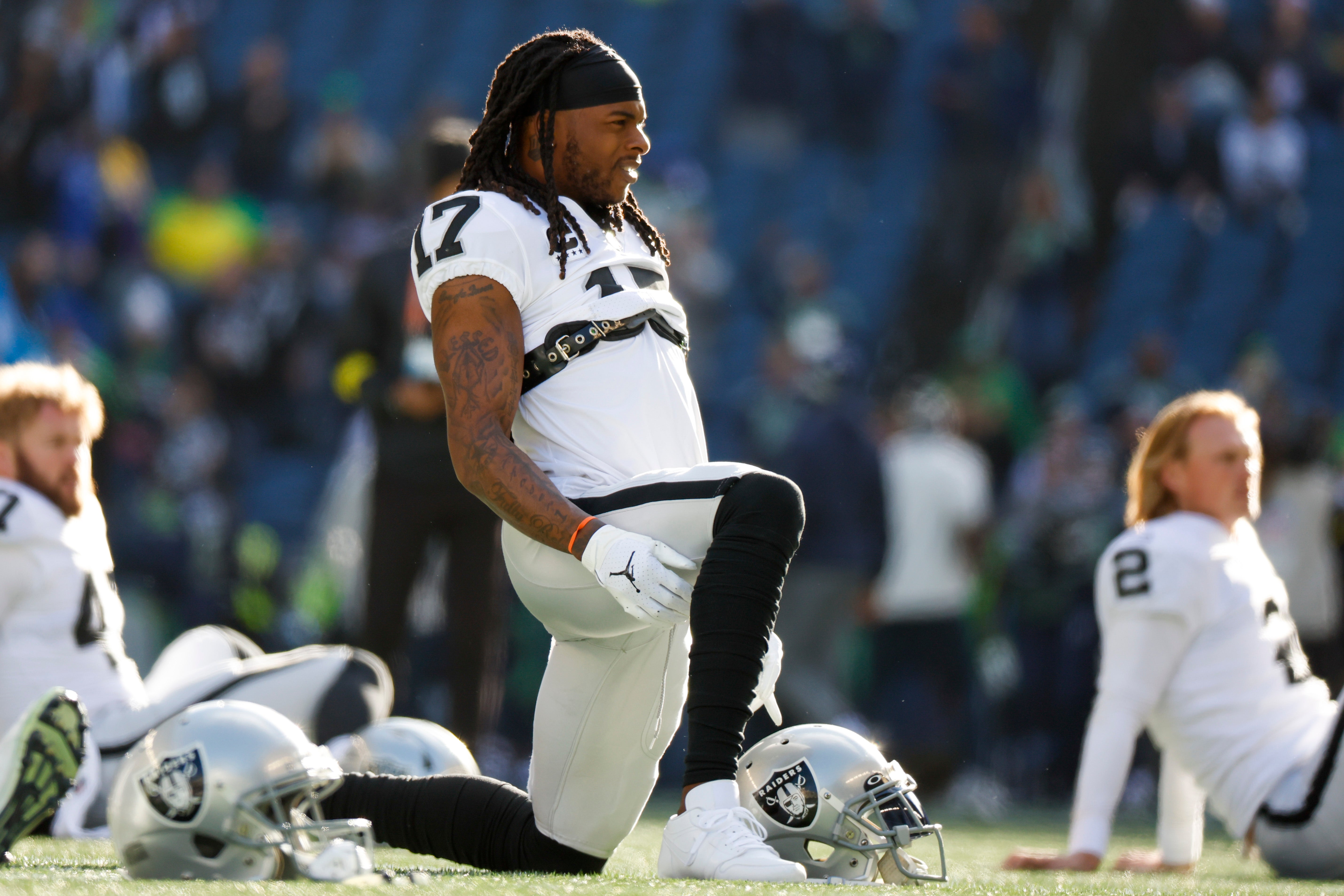 Nov 27, 2022; Seattle, Washington, USA; Las Vegas Raiders wide receiver Davante Adams (17) stretches during pregame warmups against the Seattle Seahawks at Lumen Field.