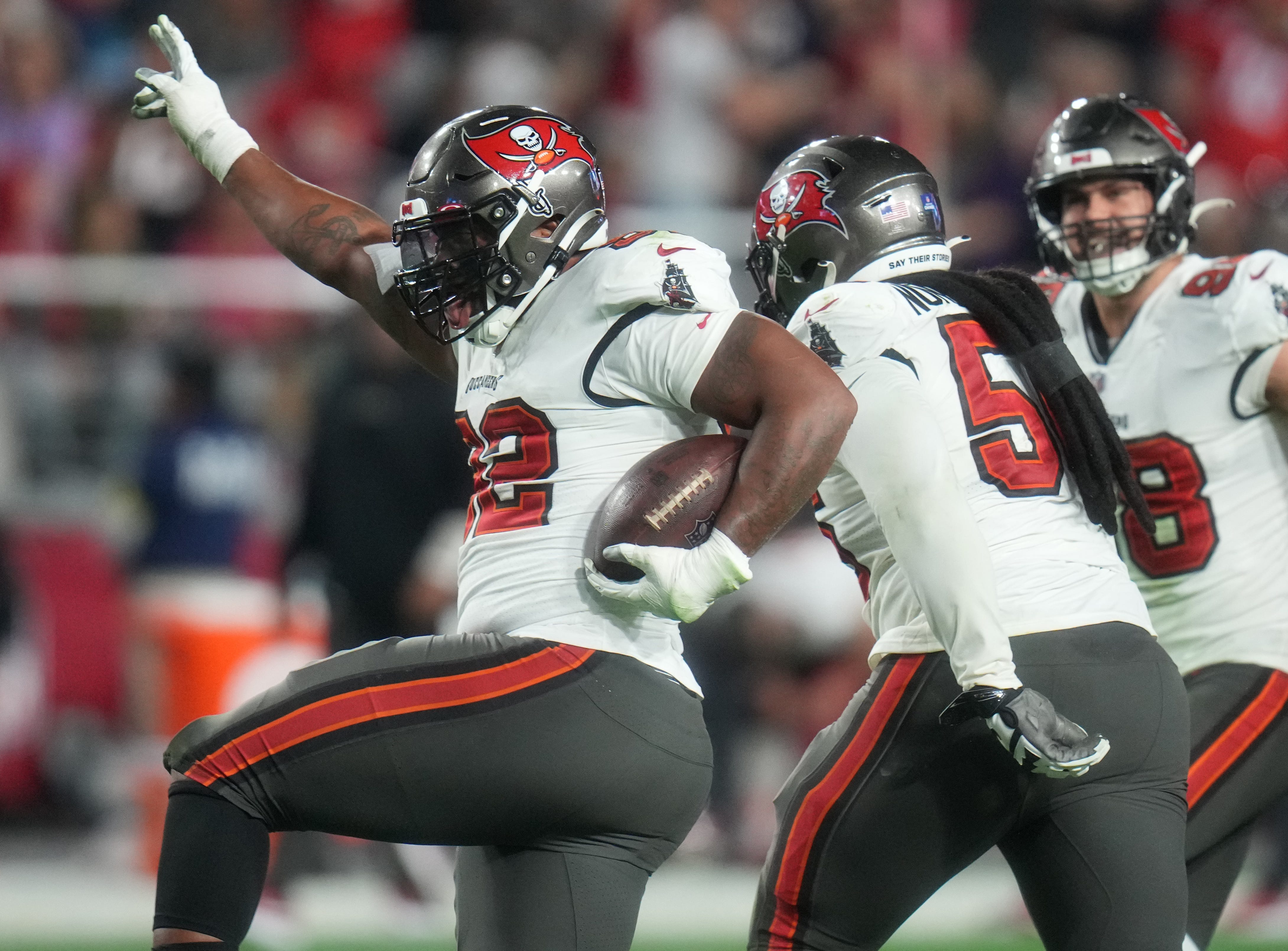 Dec 25, 2022; Glendale, Arizona, USA; Tampa Bay Buccaneers defensive lineman William Gholston (92) celebrates his fumble recovery aginst the Arizona Cardinals at State Farm Stadium.
