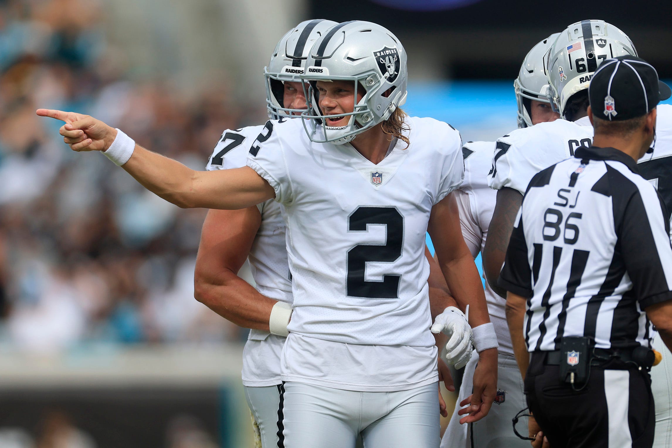 Las Vegas Raiders place kicker Daniel Carlson (2) reaches to his field goal during the second quarter of a regular season NFL football matchup Sunday, Nov. 6, 2022 at TIAA Bank Field in Jacksonville. The Jacksonville Jaguars held off the Las Vegas Raiders 27-20. [Corey Perrine/Florida Times-Union] Jki 110622 Raiders Jags Cp 138.