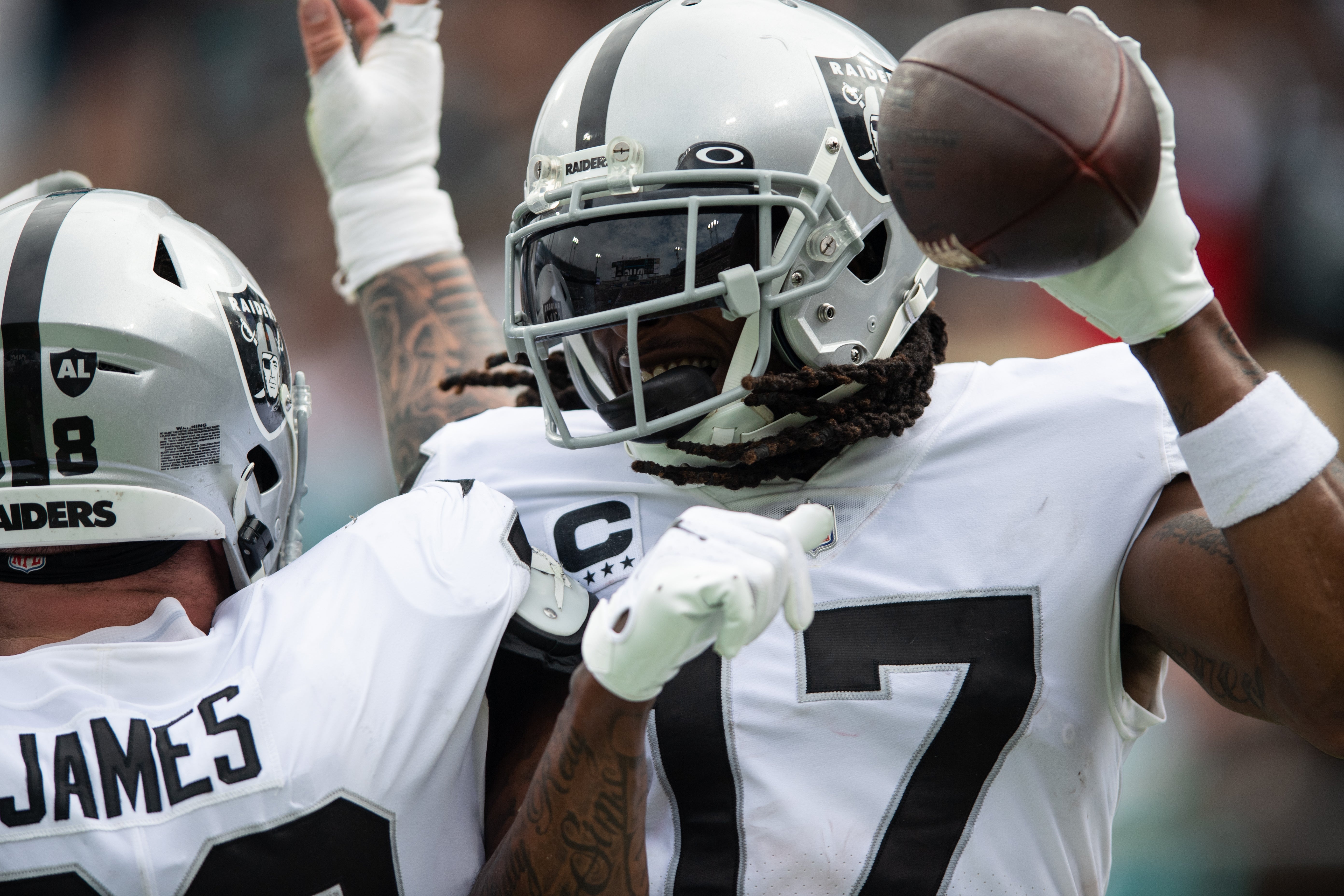 Nov 6, 2022; Jacksonville, Florida, USA; Las Vegas Raiders wide receiver Davante Adams (17) celebrates a touchdown against the Jacksonville Jaguars in the second quarter at TIAA Bank Field.