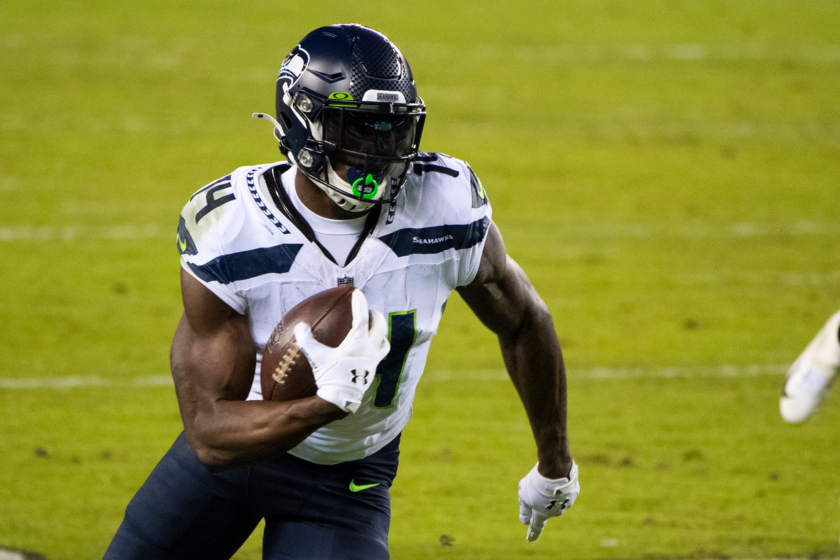 Seahawks' D.K. Metcalf (14) carries the ball against the Eagles Monday, Nov. 30, 2020 in Philadelphia. Jl Eagles 113020 23.