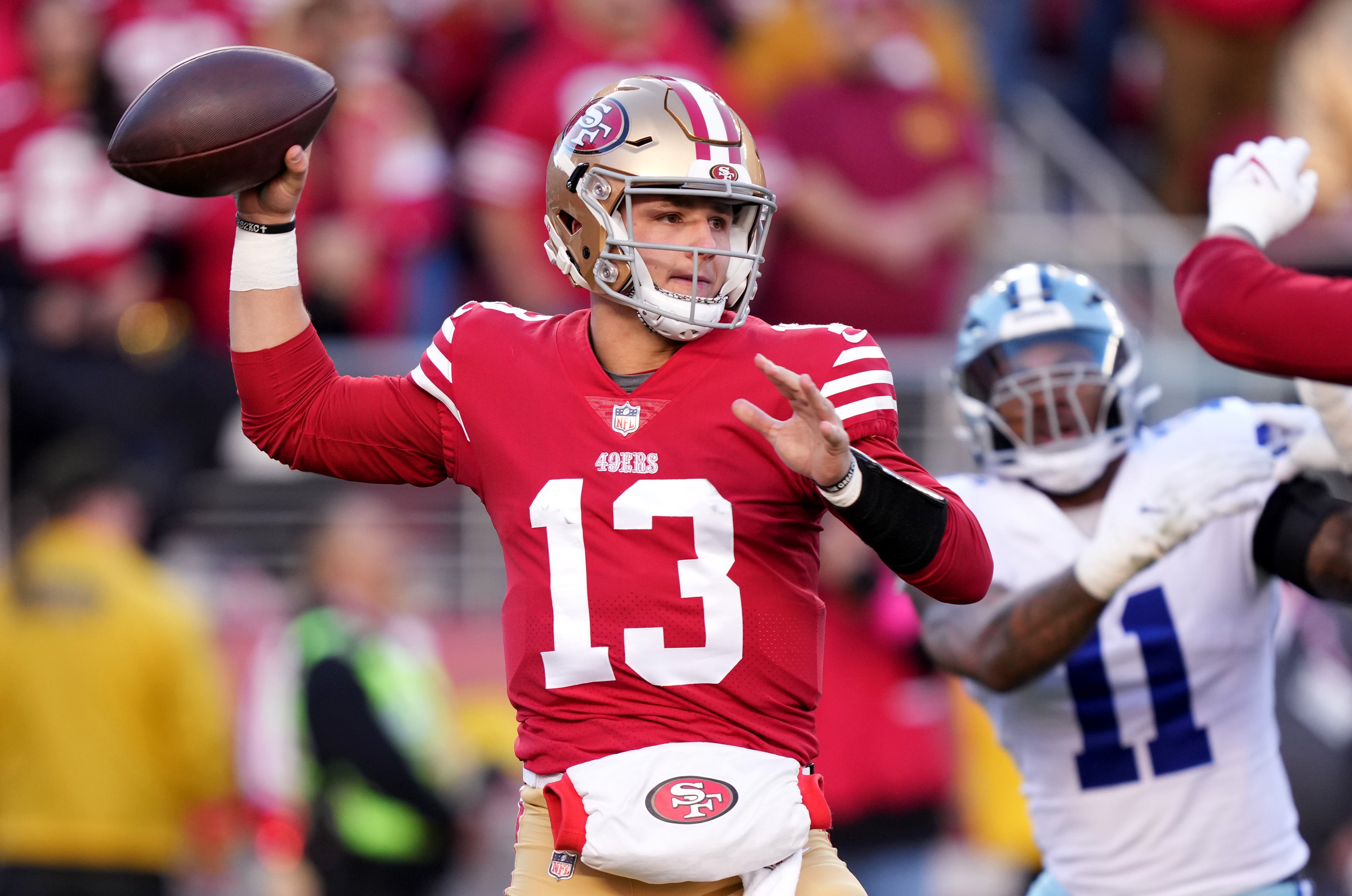 Jan 22, 2023; Santa Clara, California, USA; San Francisco 49ers quarterback Brock Purdy (13) throws during the first quarter of a NFC divisional round game against the Dallas Cowboys at Levi's Stadium. Mandatory Credit: Kyle Terada-USA TODAY Sports