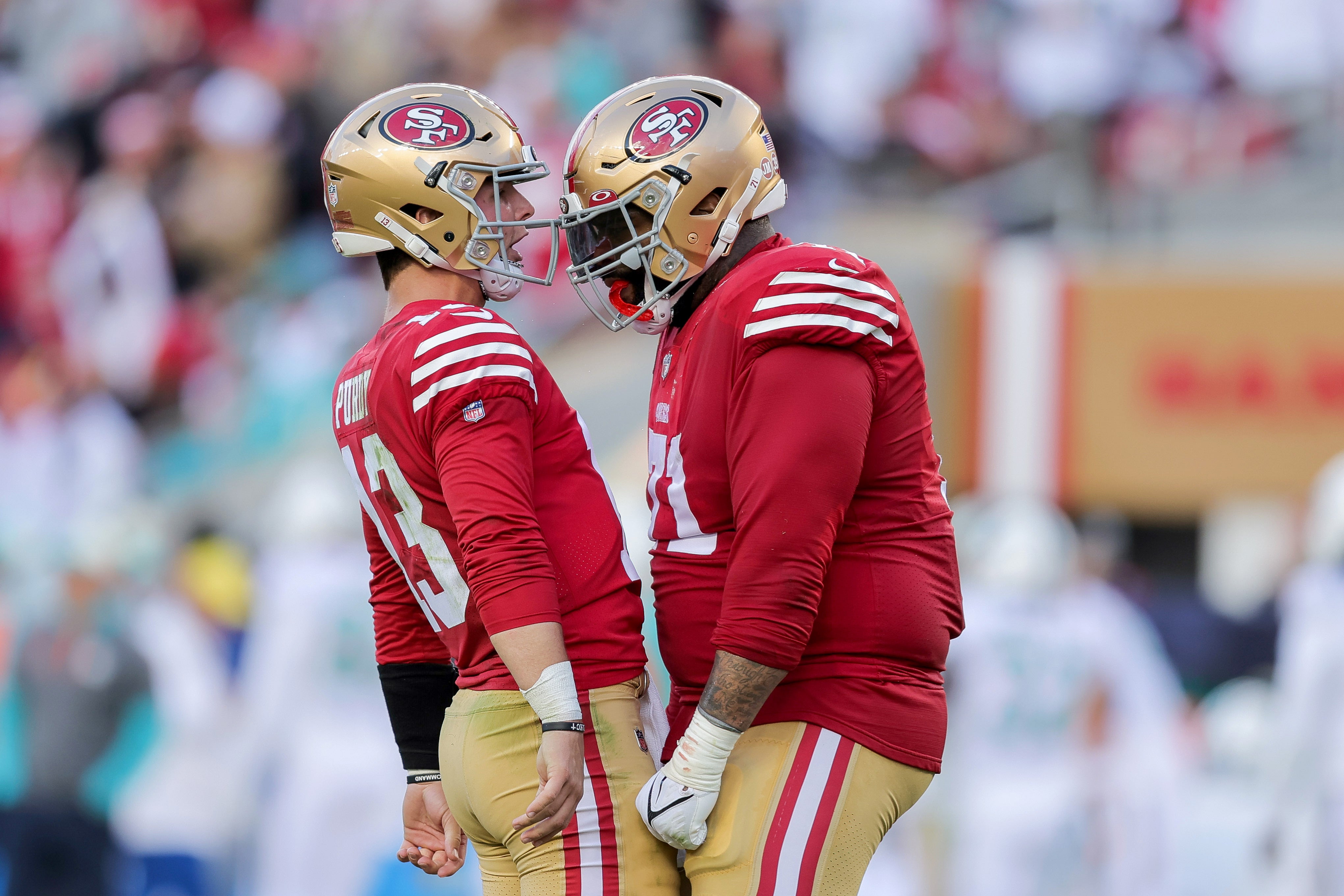 Dec 4, 2022; Santa Clara, California, USA; San Francisco 49ers quarterback Brock Purdy (13) celebrates with offensive tackle Trent Williams (71) after a touchdown during the second quarter at Levi's Stadium.