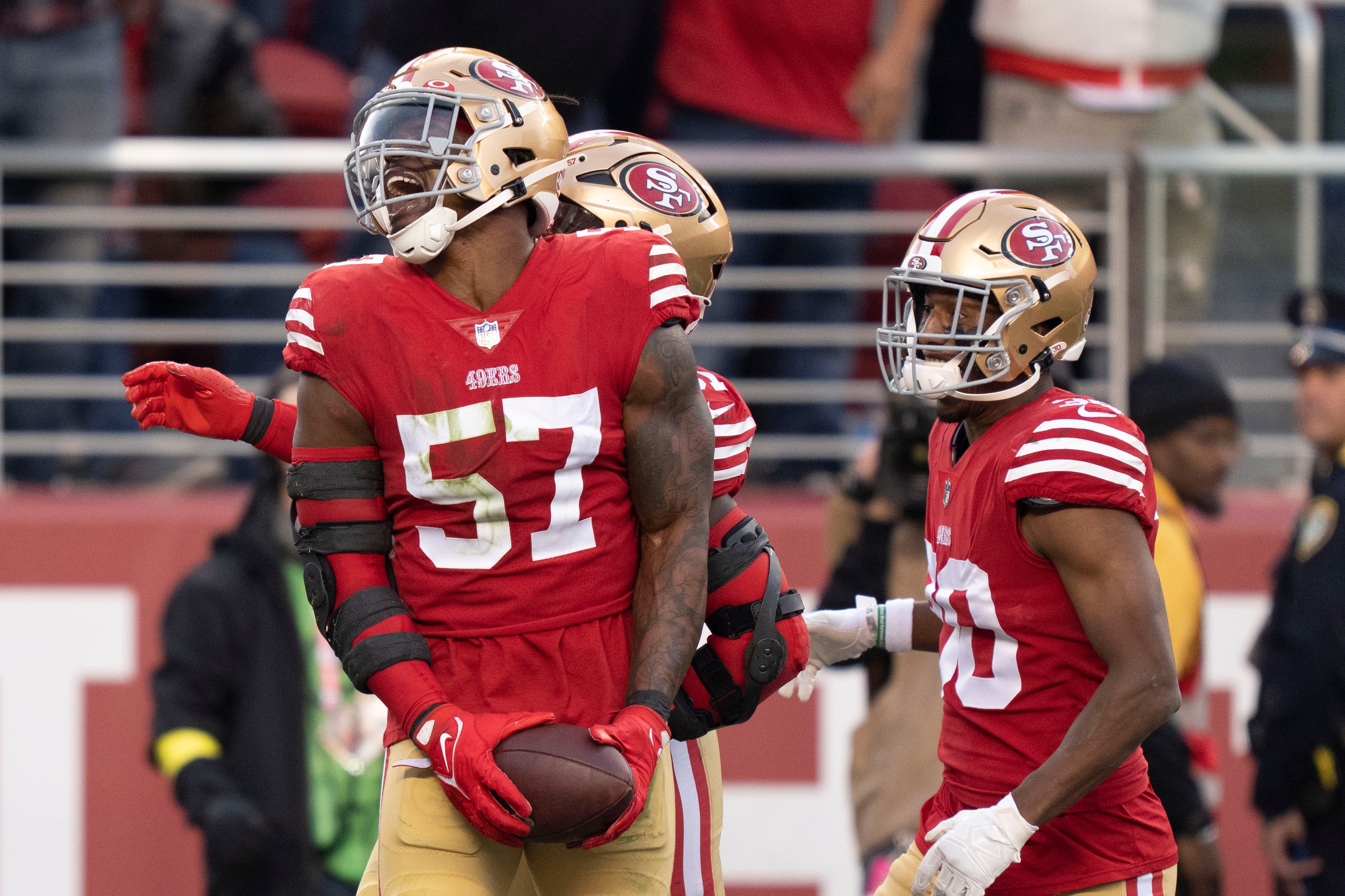 November 27, 2022; Santa Clara, California, USA; San Francisco 49ers linebacker Dre Greenlaw (57) celebrates after defensive stop against the New Orleans Saints during the fourth quarter at Levi's Stadium.