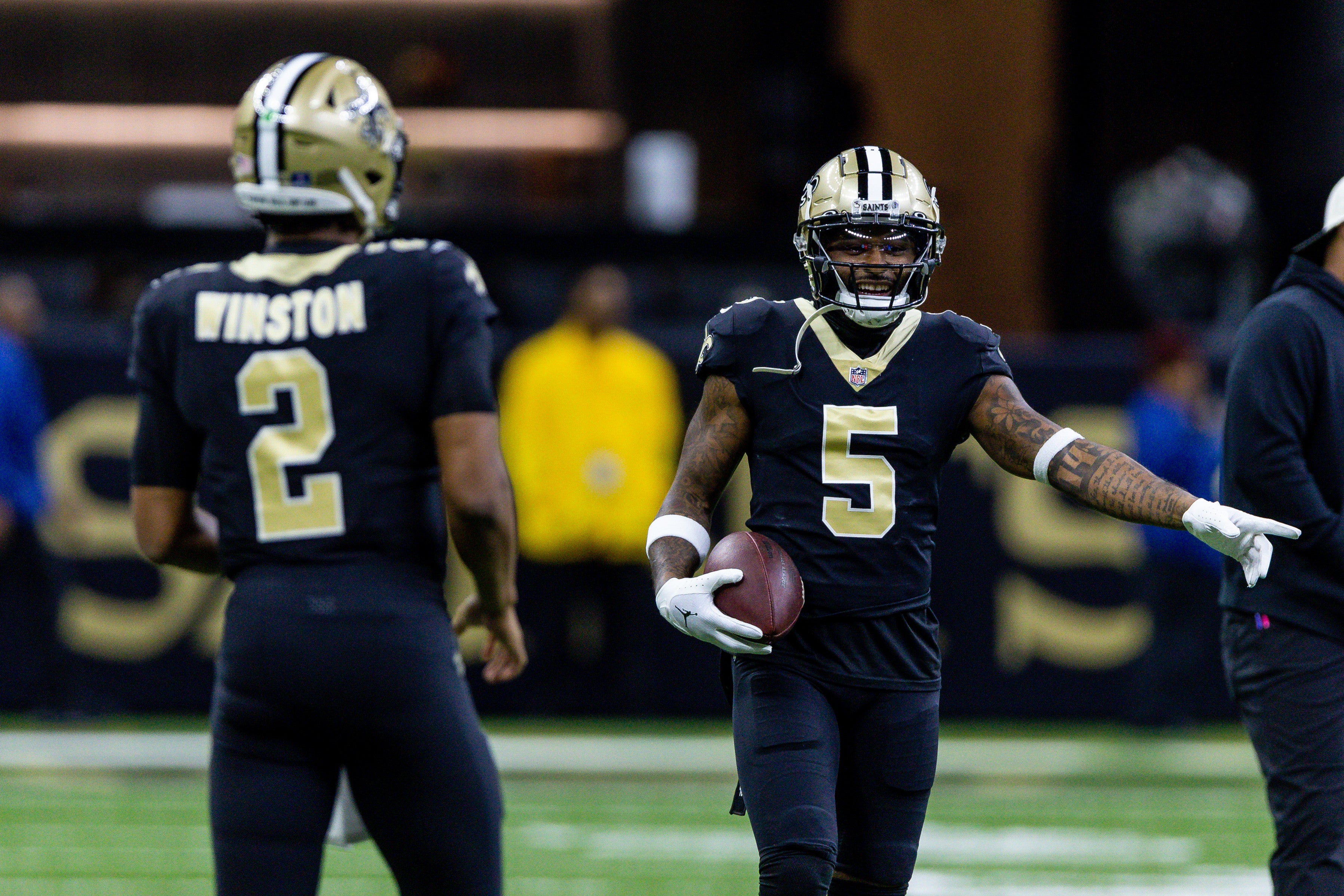 Dec 18, 2022; New Orleans, Louisiana, USA; New Orleans Saints quarterback Jameis Winston (2) passes to wide receiver Jarvis Landry (5) during warm ups before the game against the Atlanta Falcons at Caesars Superdome.