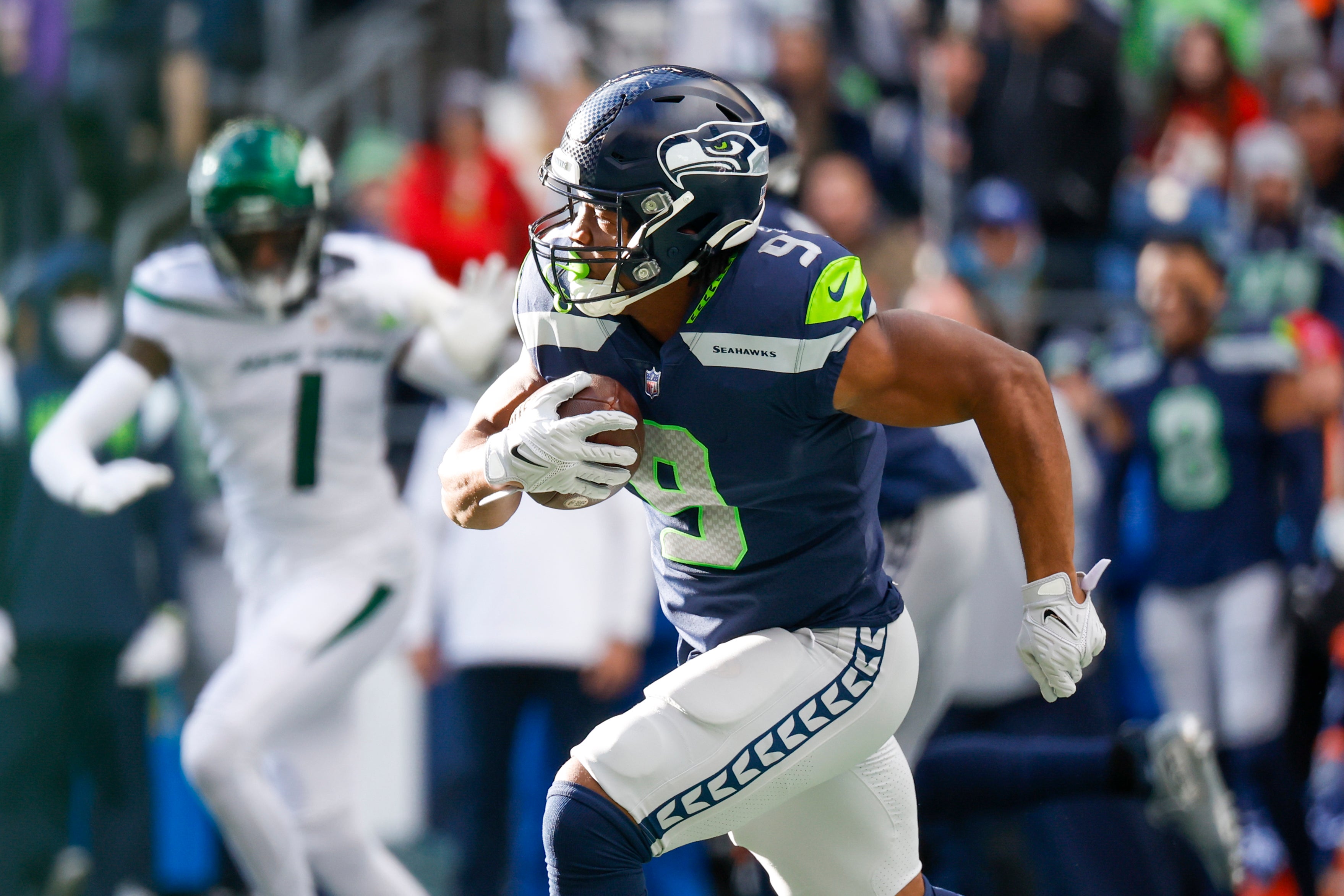 Jan 1, 2023; Seattle, Washington, USA; Seattle Seahawks running back Kenneth Walker III (9) rushes against the New York Jets during the first quarter at Lumen Field.