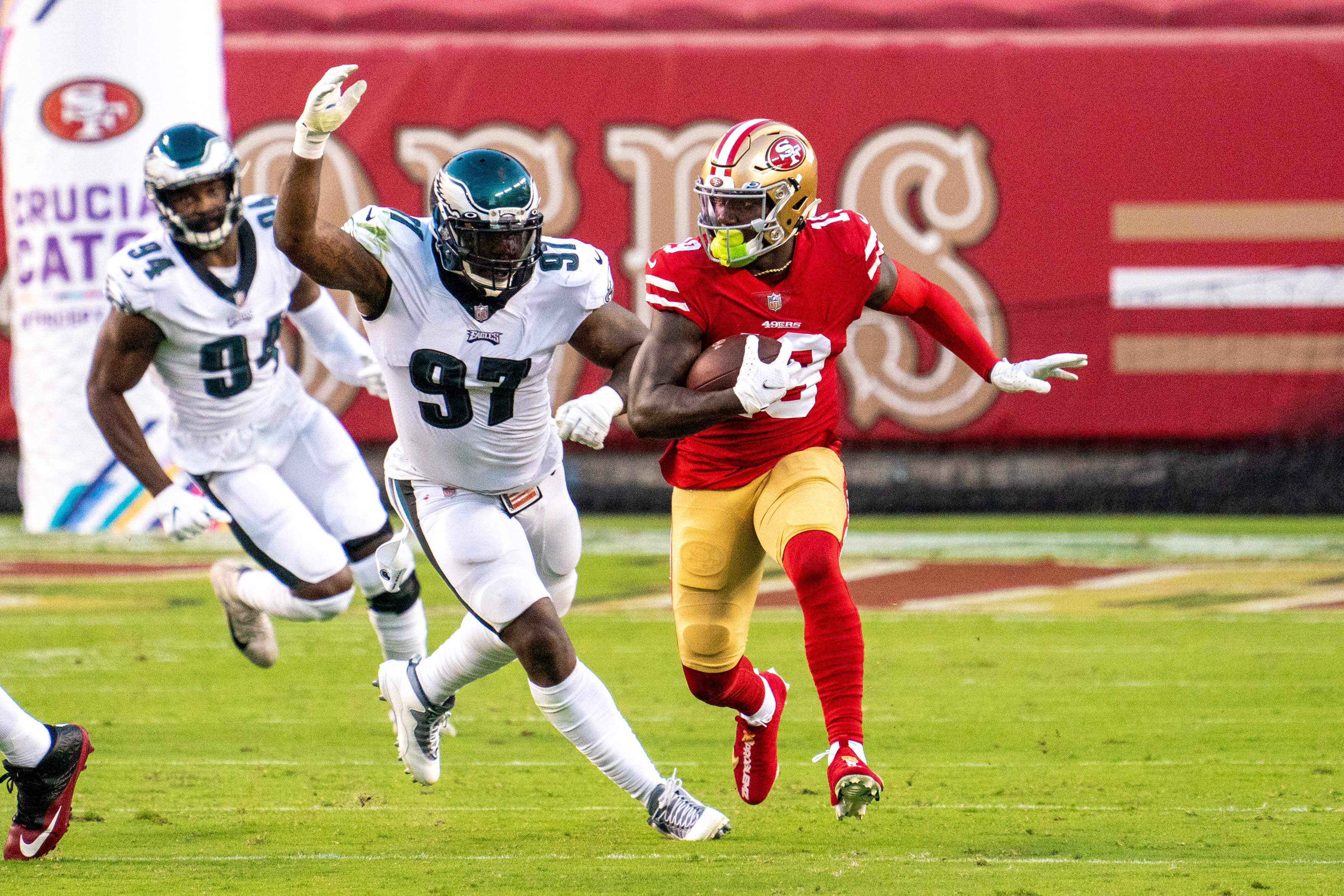 October 4, 2020; Santa Clara, California, USA; San Francisco 49ers wide receiver Deebo Samuel (19) against Philadelphia Eagles defensive tackle Malik Jackson (97) during the second quarter at Levi's Stadium.