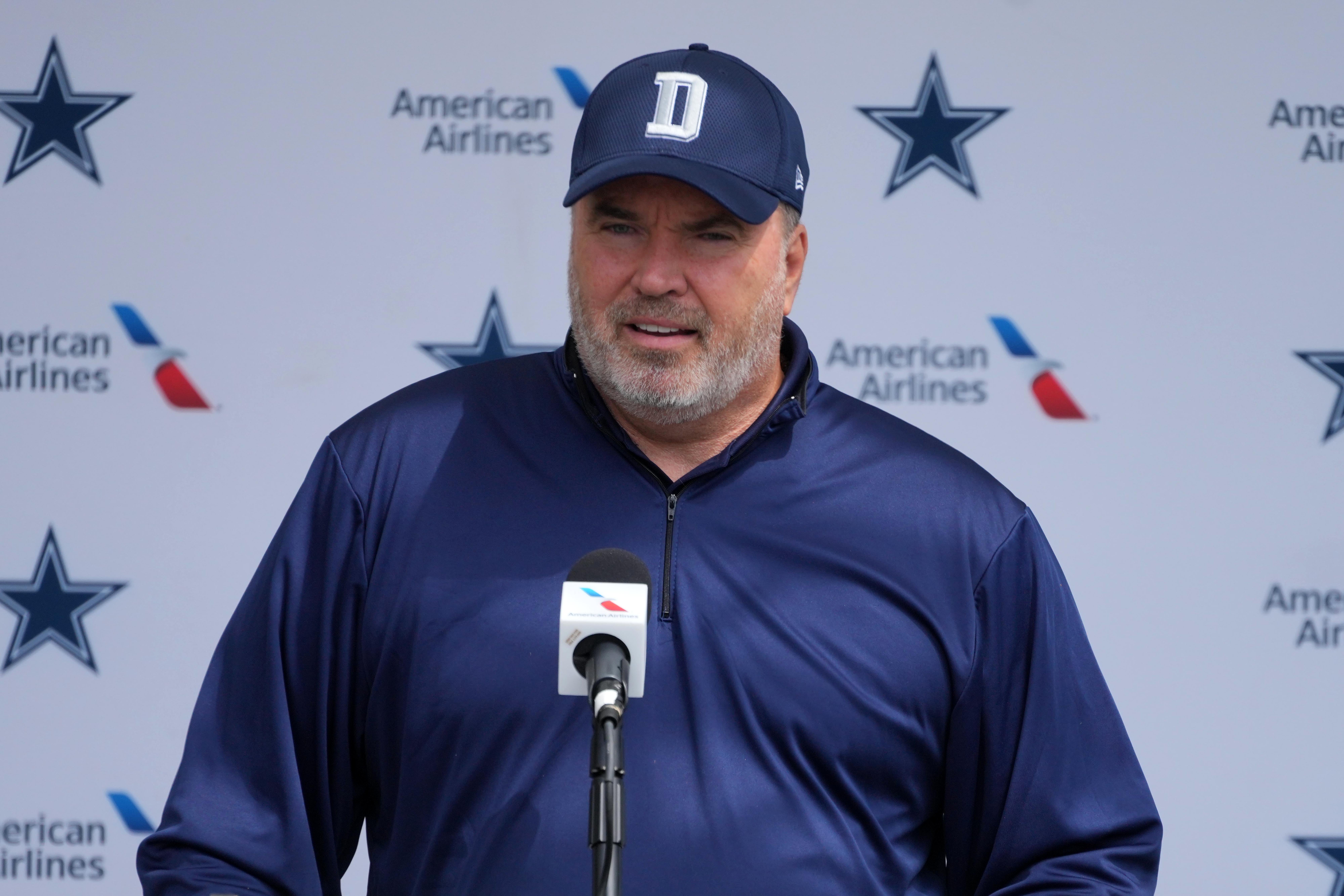 Dallas Cowboys head coach Mike McCarthy taking the podium in training camp.