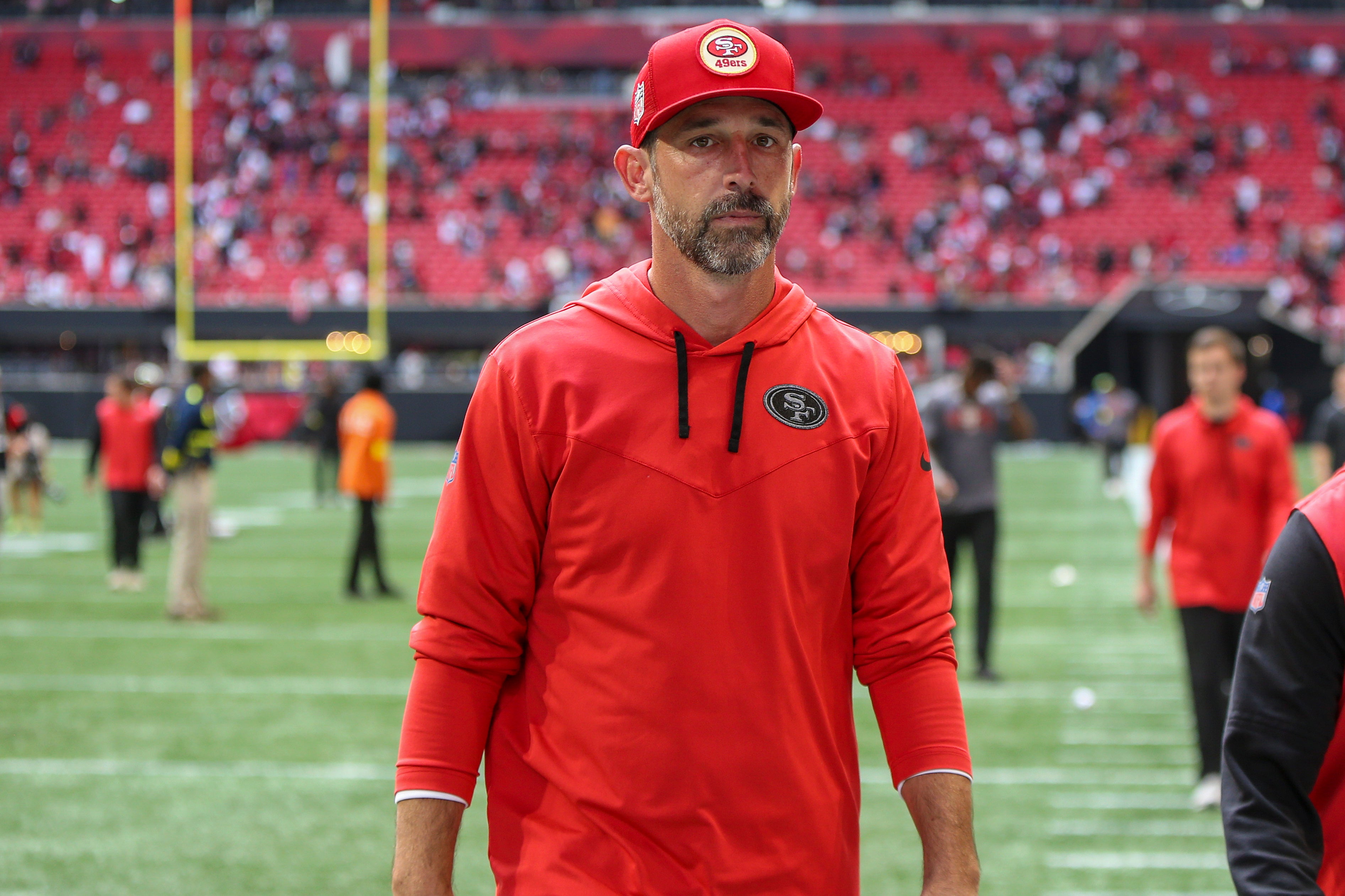 Oct 16, 2022; Atlanta, Georgia, USA; San Francisco 49ers head coach Kyle Shanahan walks off the field after a loss against the Atlanta Falcons at Mercedes-Benz Stadium. Mandatory Credit: Brett Davis-USA TODAY Sports