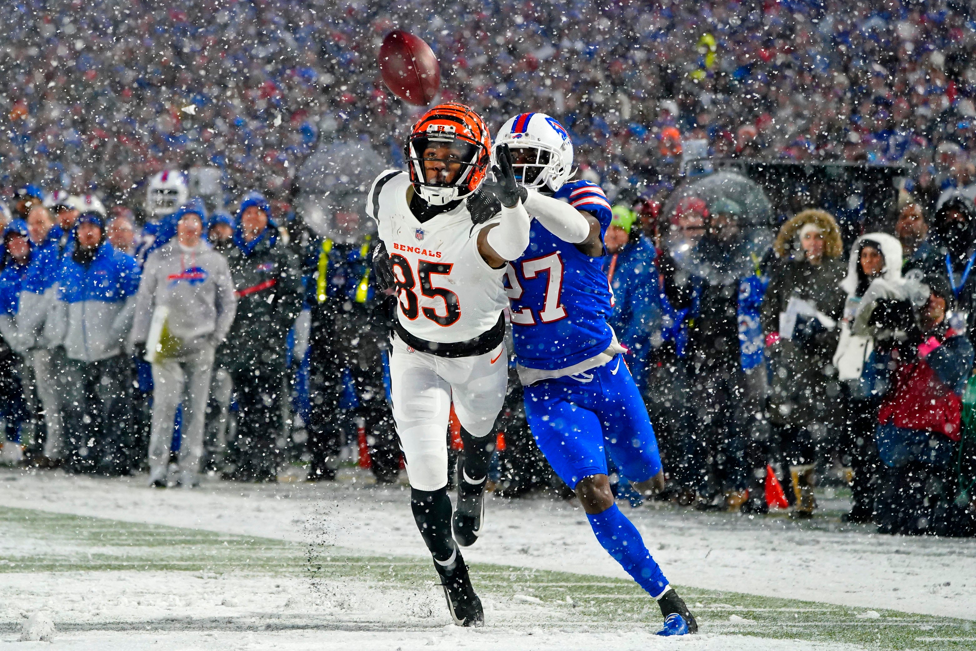 Jan 22, 2023; Orchard Park, New York, USA; Buffalo Bills cornerback Tre'Davious White (27) breaks up a pass and was penalized for pass interference against Cincinnati Bengals wide receiver Tee Higgins (85) during the fourth quarter of an AFC divisional round game at Highmark Stadium.