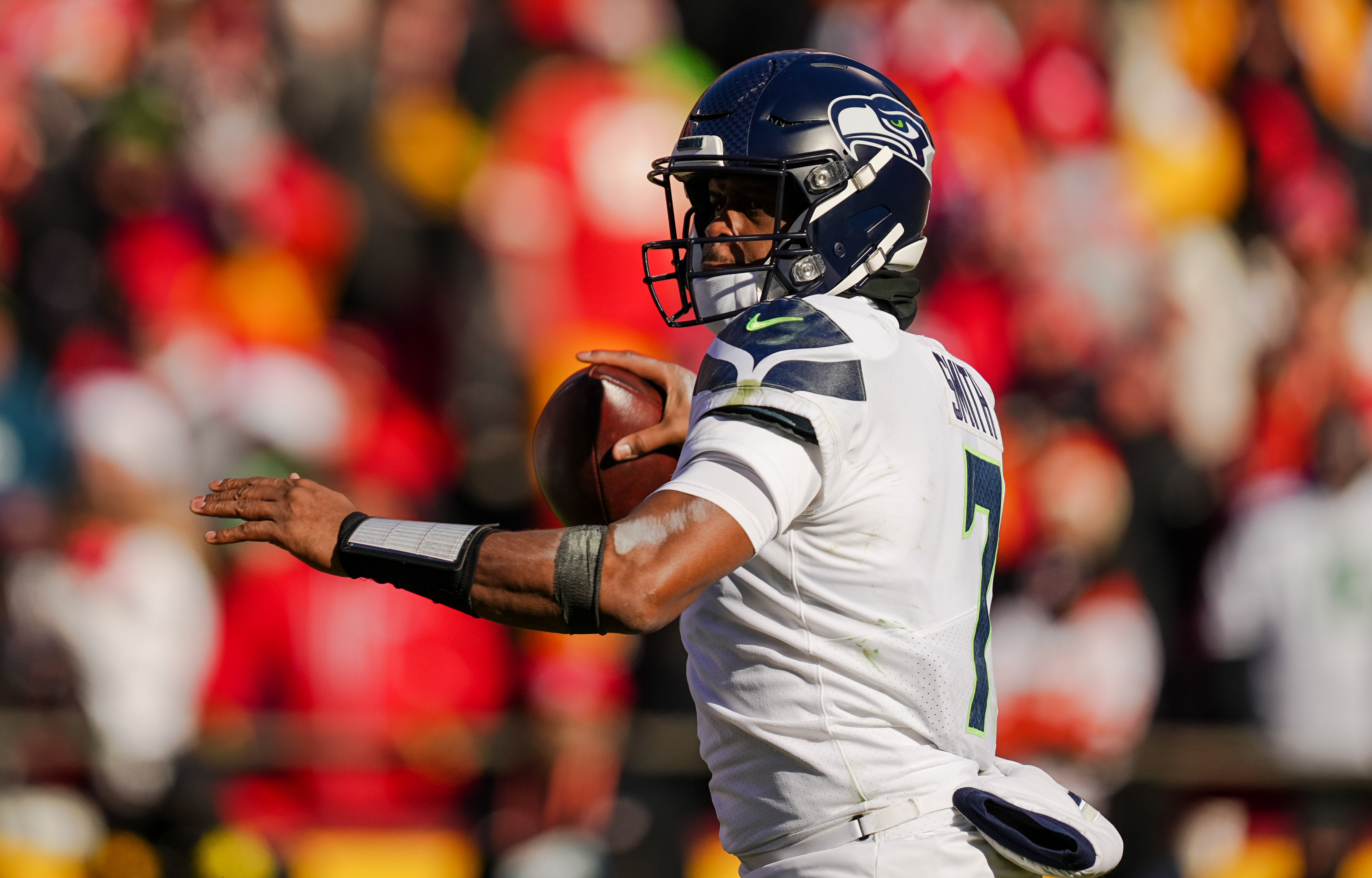 Dec 24, 2022; Kansas City, Missouri, USA; Seattle Seahawks quarterback Geno Smith (7) throws a pass during the first half against the Kansas City Chiefs at GEHA Field at Arrowhead Stadium. Mandatory Credit: Jay Biggerstaff-USA TODAY Sports
