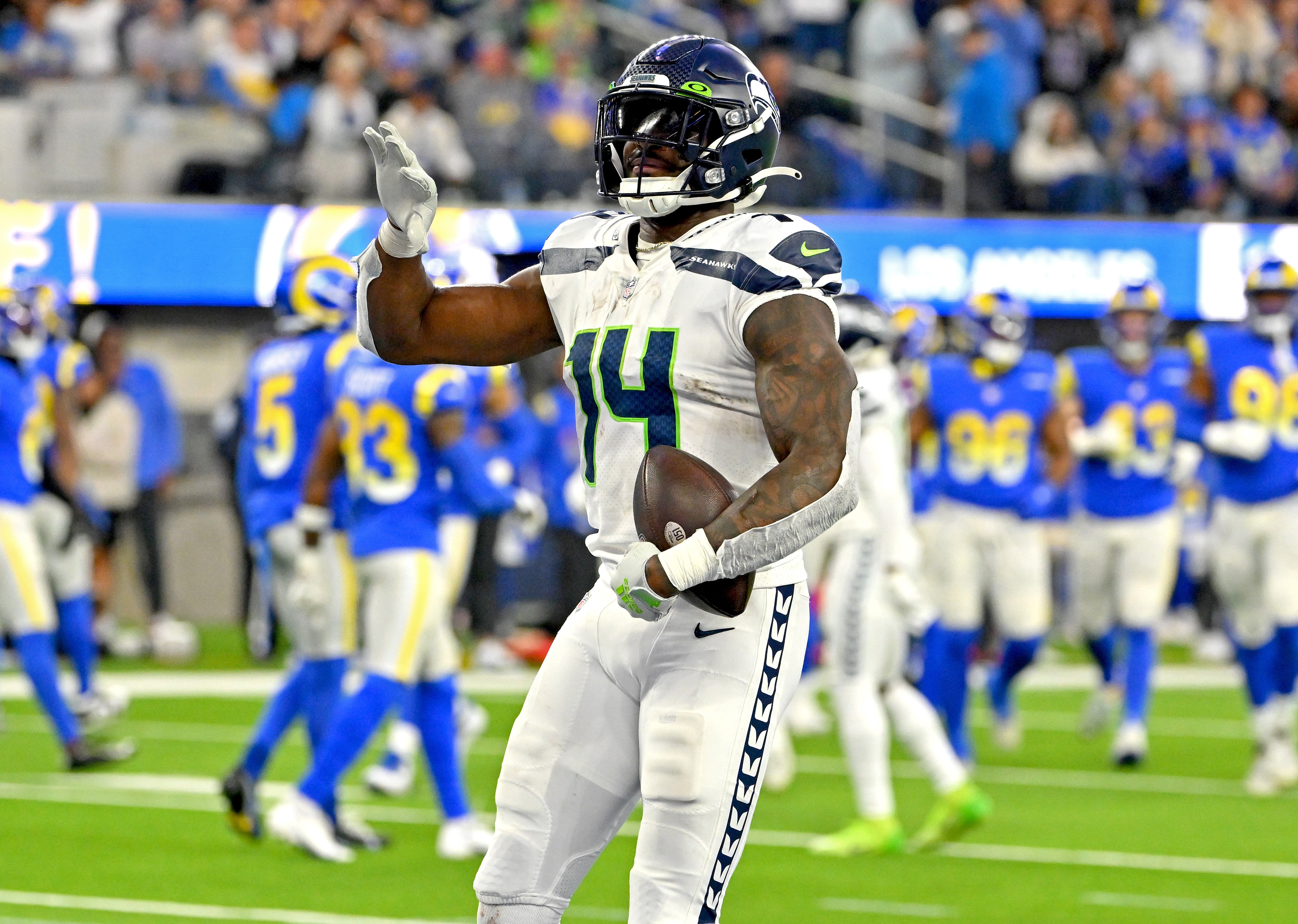 Dec 4, 2022; Inglewood, California, USA; Seattle Seahawks wide receiver DK Metcalf (14) celebrates after a touchdown in the fourth quarter against the Los Angeles Rams at SoFi Stadium. Mandatory Credit: Jayne Kamin-Oncea-USA TODAY Sports